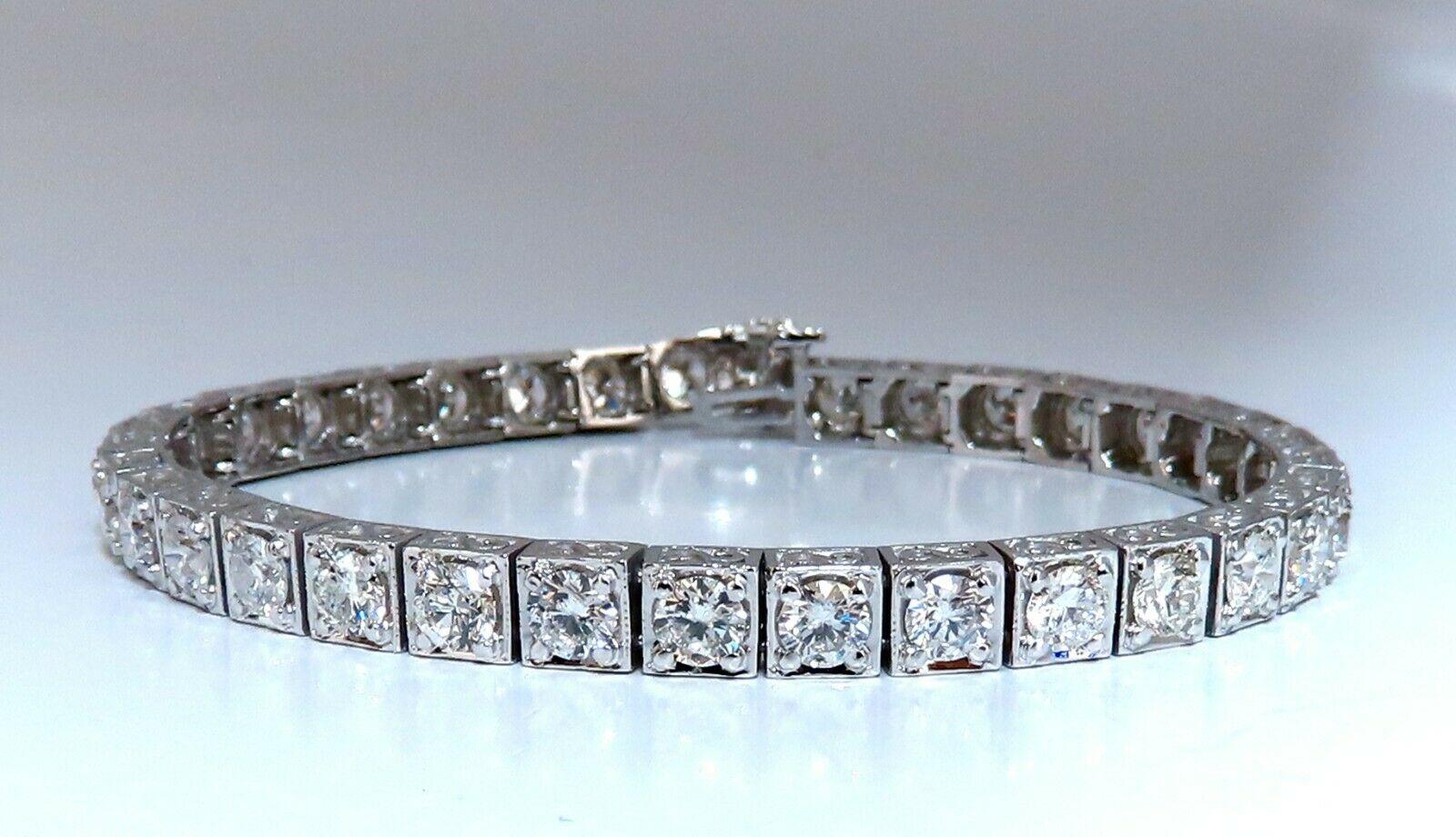 Classic Tennis / Squared Box Bead Set

8.42ct. Natural  diamonds bracelet.

Round, full cuts 

G color / Si-1 clarity.

14kt. white gold 

20.4 Grams.

Width of bracelet: 5.2mm

7.25  inch wearable length

safety clasp/ snap lock

$48,000 Appraisal