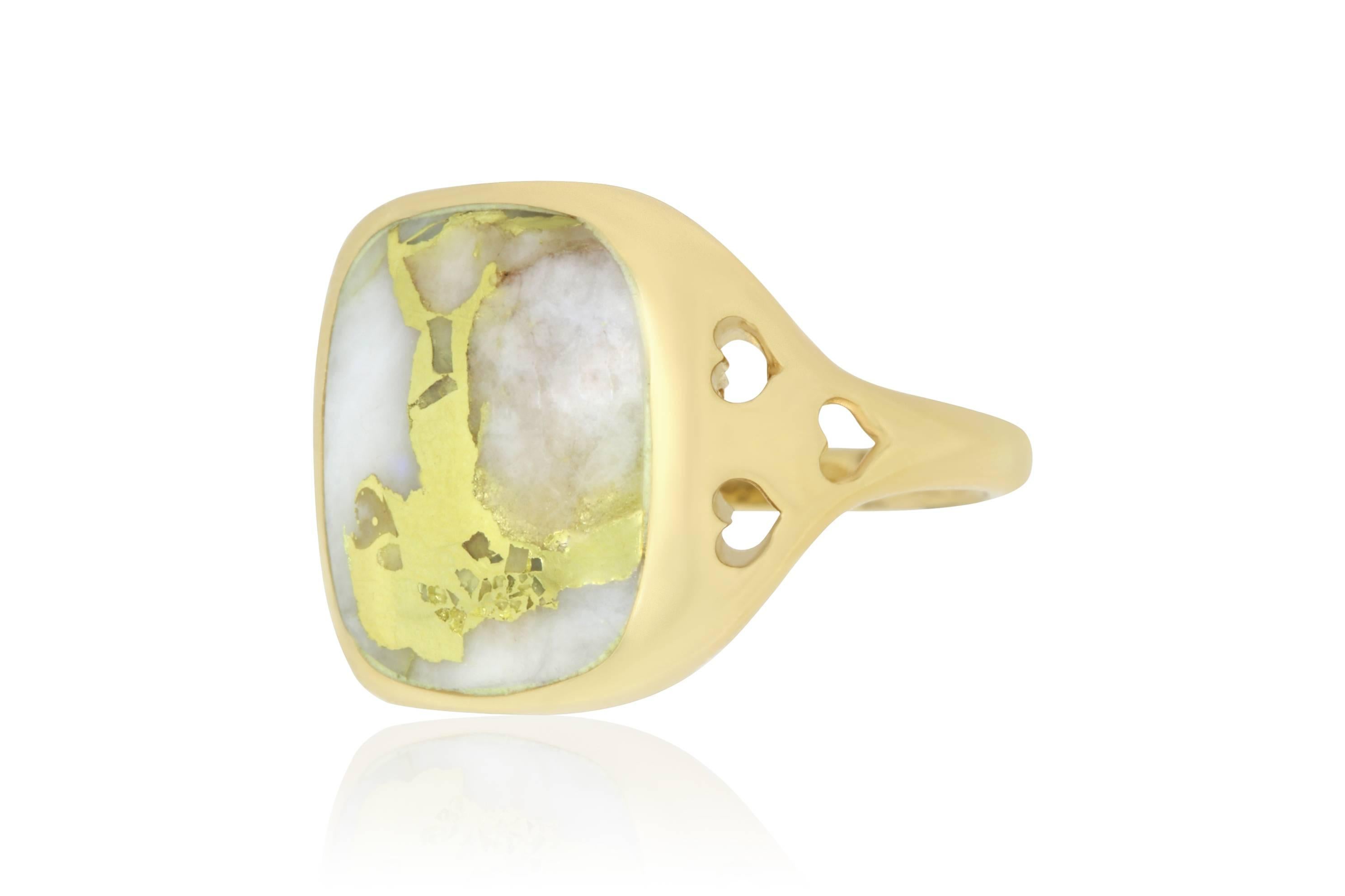 This unique Gold in Quartz stone weighs in at 8.43 carats. Set in a 14k Yellow Gold band featuring 3 hearts on each side.

Material: 14k Yellow Gold
Gemstones: 1 Rectangular Gold in Quartz at 8.43 Carats.
Ring Size: 6.5. Alberto offers complimentary