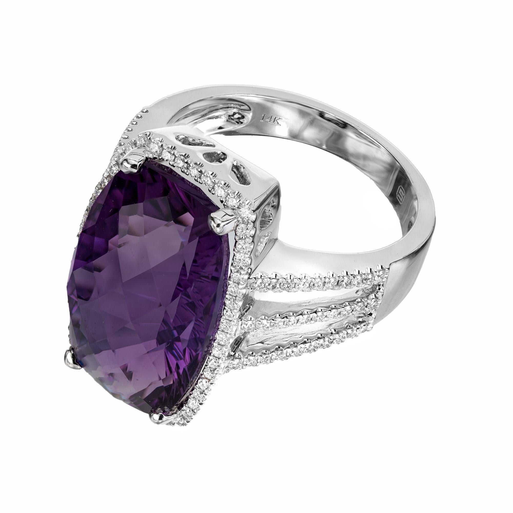 Faceted top cushion Amethyst diamond Halo ring with triple shank setting. Extra bright purple Amethyst. 
Amethyst and Diamond 14k white gold Halo Cocktail Ring. The centerpiece of the ring features a magnificent 8.43 carat cushion-cut amethyst,