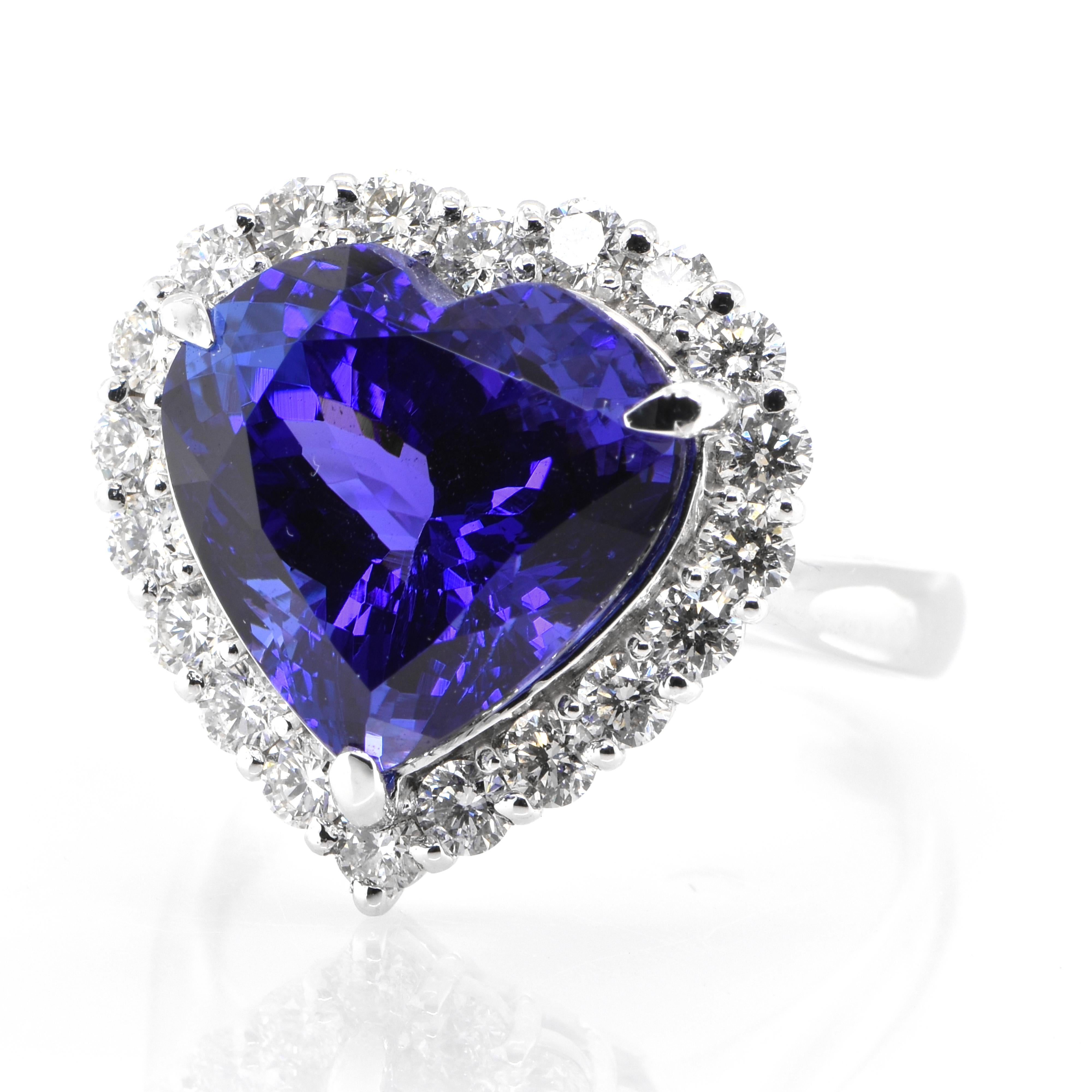 A beautiful Cocktail Ring featuring a 8.44 Carat Natural Tanzanite and 0.90 Carats of Diamond Accents set in Platinum. Tanzanite's name was given by Tiffany and Co after its only known source: Tanzania. Tanzanite displays beautiful pleochroic colors