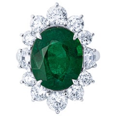 8.44 Carat Oval Emerald with 3.35 Carat in Diamond Floral Halo Platinum Ring