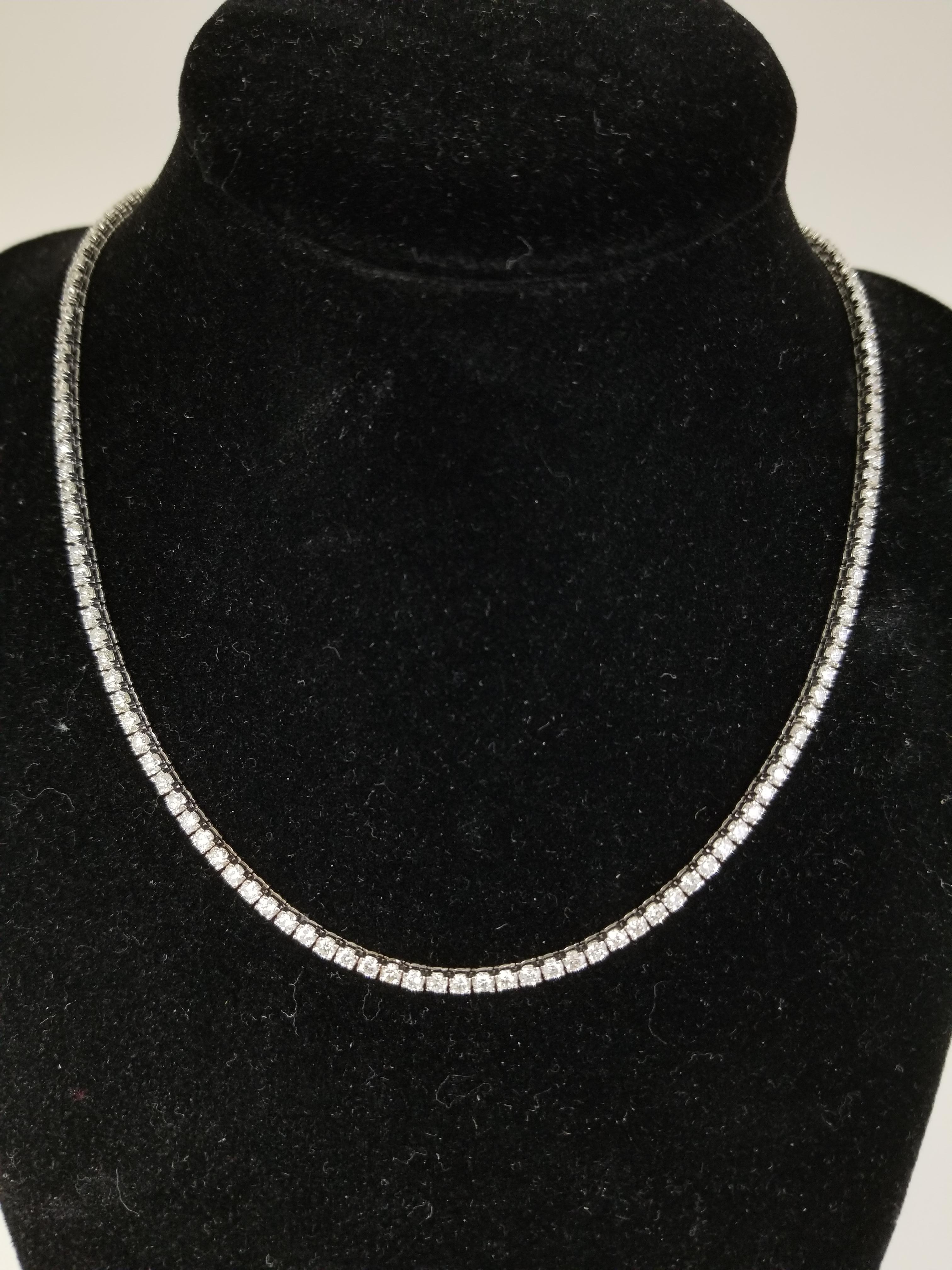 Great quality tennis necklace, round-brilliant cut white diamonds clean and Excellent shine. 14K white gold classic four-prong style for maximum light brilliance. Exquisite style for every day.

Length 18 inch
Average Color H , Clarity VS
2.6 MM