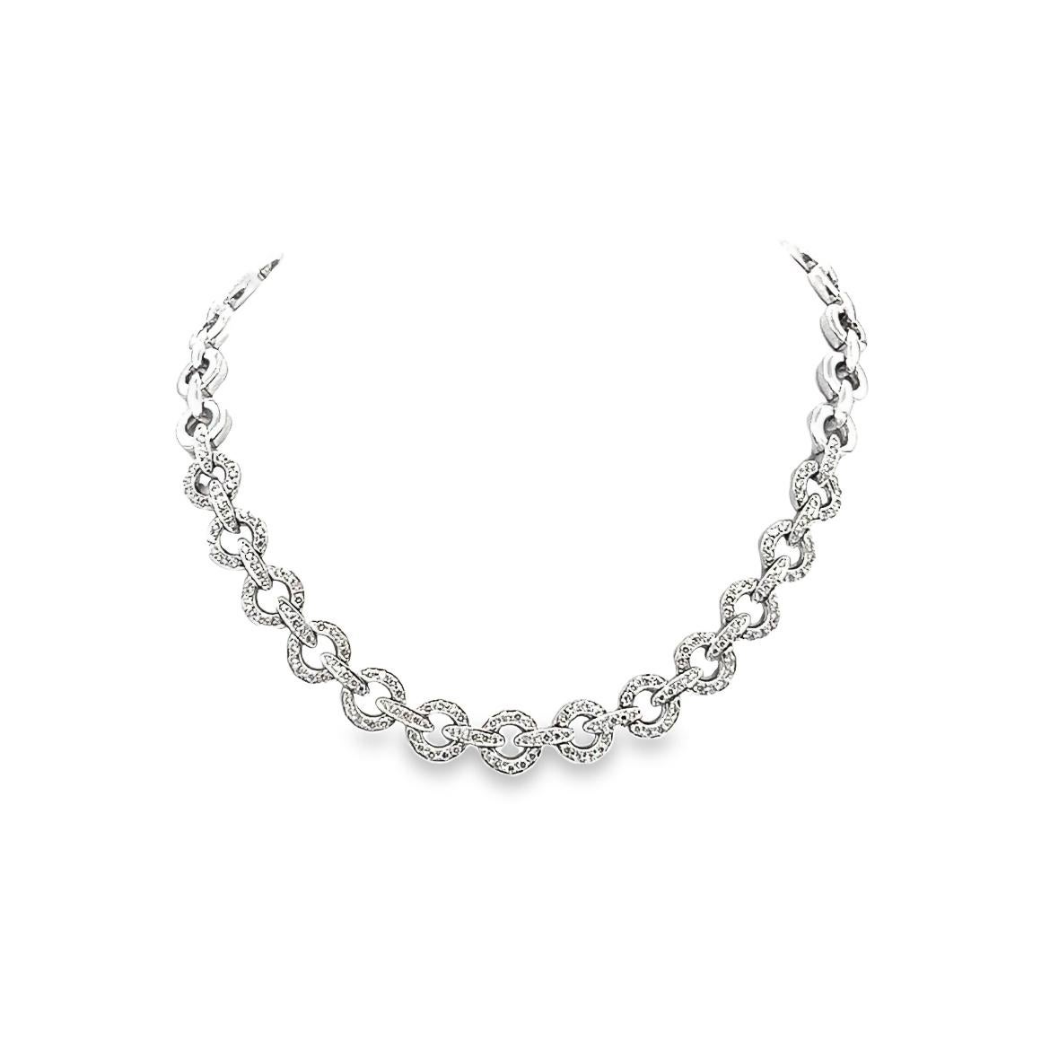 Are you looking for a stunning set of diamond jewelry to add to your collection? Look no further! This one-of-a-kind Choker Diamond Necklace with a matching Diamond Bracelet is exactly what you need. Both items have a weight of 123.2 grams and carry