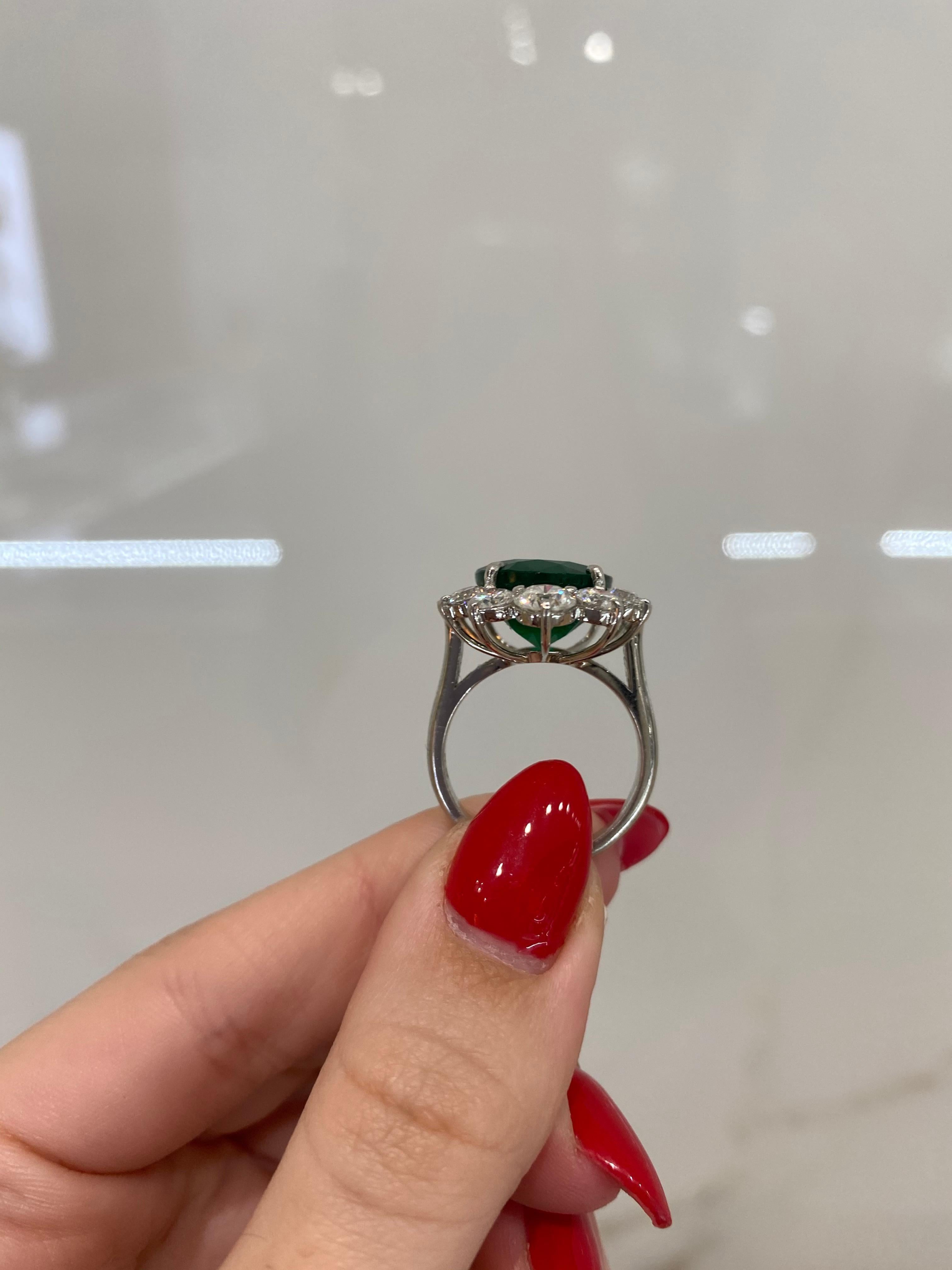 8.44 Carat Oval Emerald with 3.35 Carat in Diamond Floral Halo Platinum Ring 1