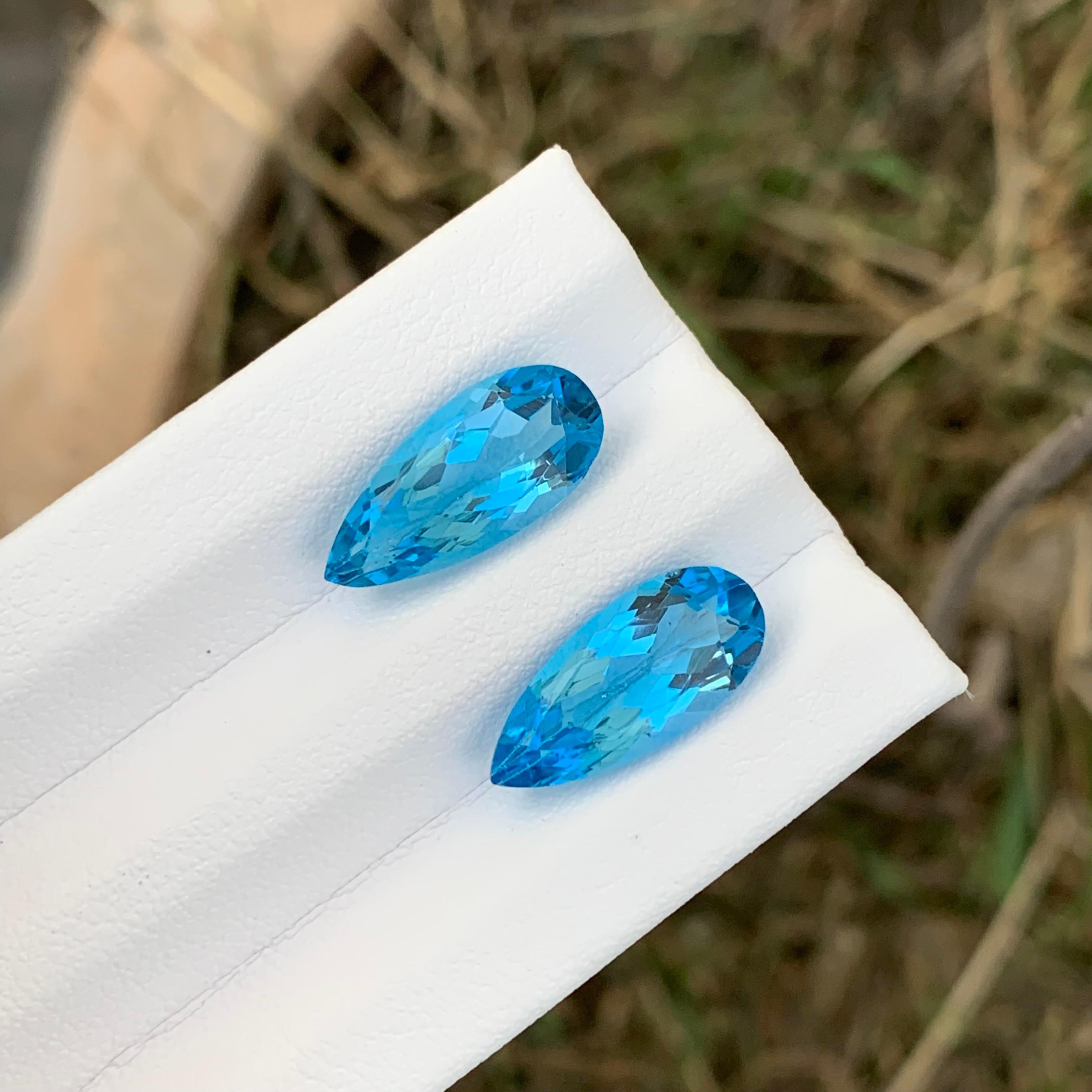 Loose Blue Topaz Pair 
Weight: 8.45 Carats
Dimensions: 15.7 x 7.1 x 4.9 Mm
Origin: Brazil
Shape: Pear
Color: Blue
Certificate: On Demand

Benefits Of Wearing Blue Topaz Stone:
It helps to improve communication and self-expression.
It provides inner