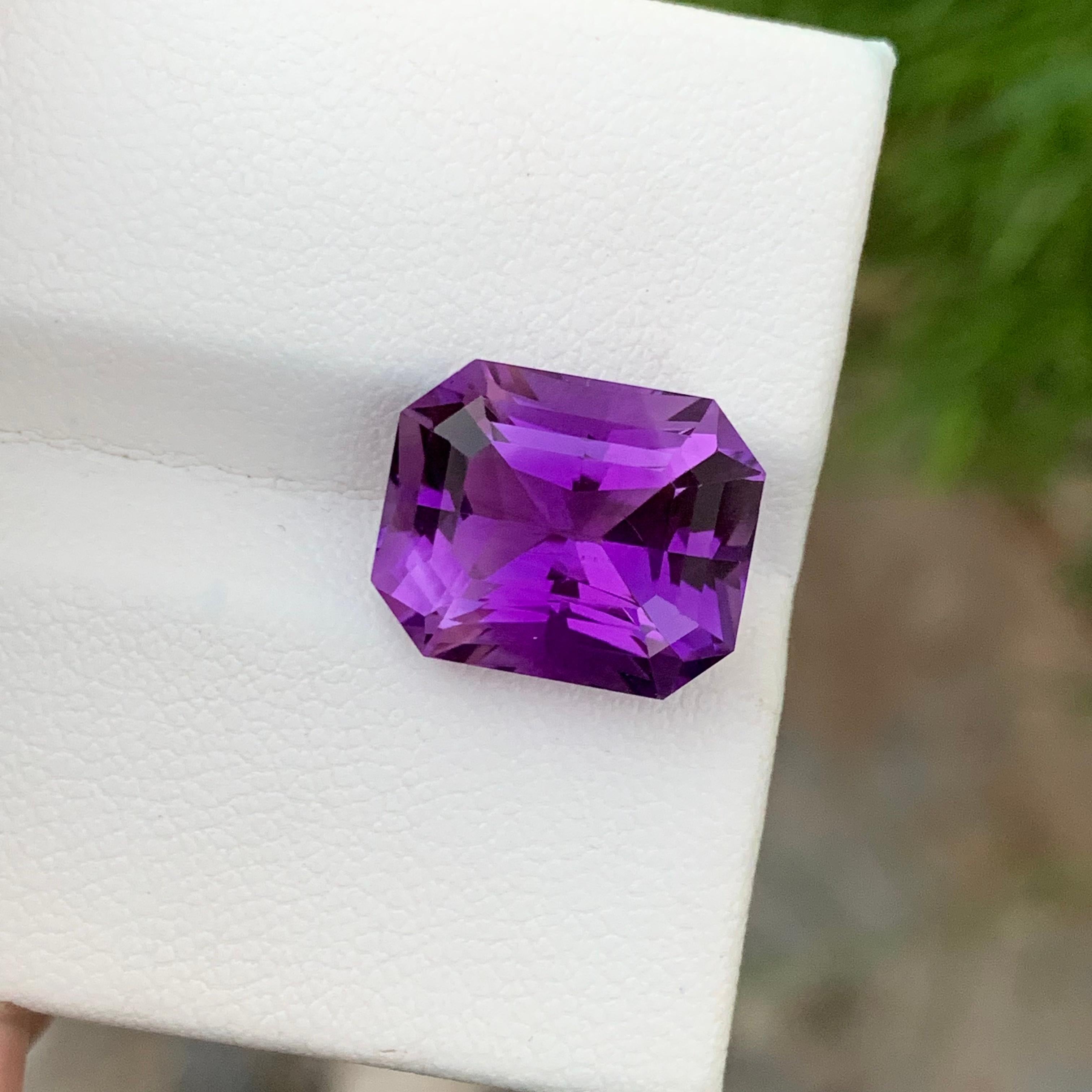 Faceted Amethyst 
Weight: 8.45 Carats 
Dimension: 13.6x11.1x8.7 Mm
Origin: Brazil
Color: Purple 
Shape: Emerald 
Certificate: On Customer Demand 
Amethyst is a beautiful purple variety of the mineral quartz, known for its striking color and