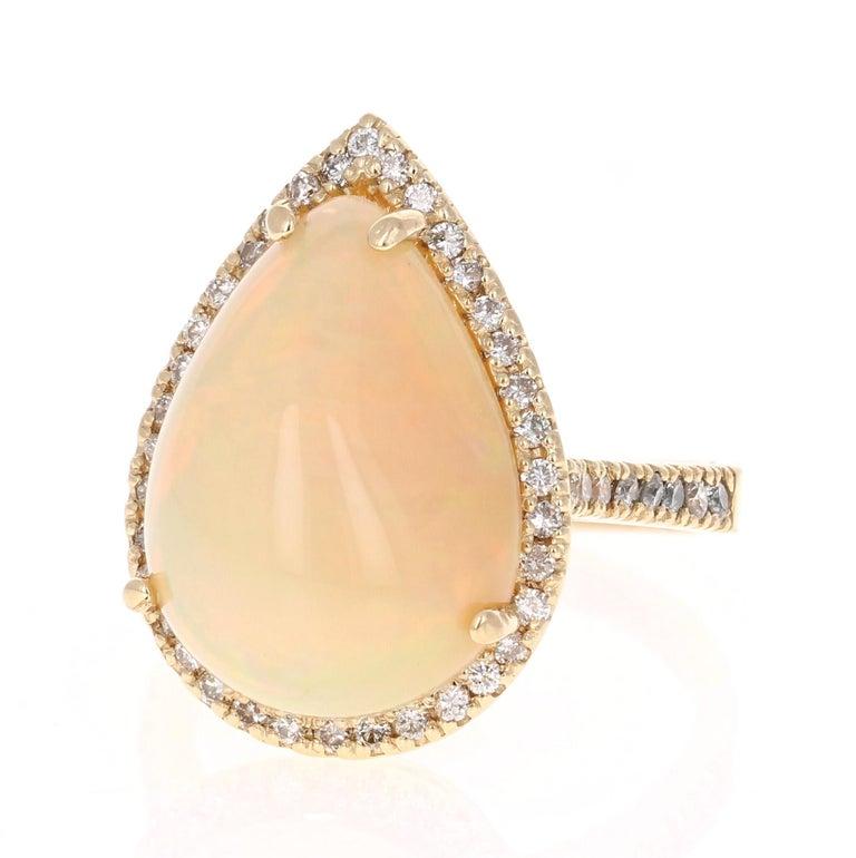 Contemporary 8.47 Carat Pear Cut Opal Diamond 14 Karat Yellow Gold Ring For Sale