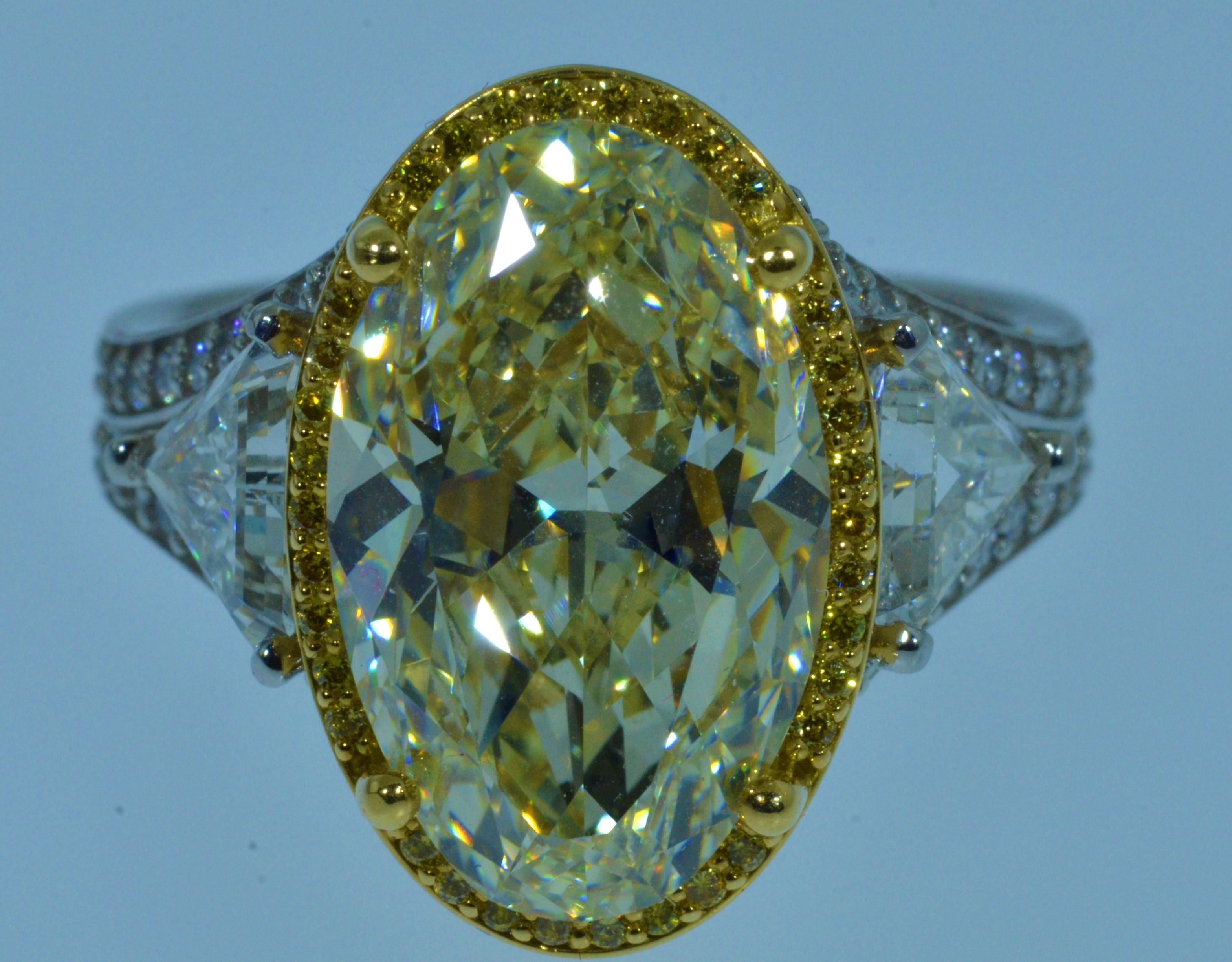 8.48 Carat Oval Diamond Flanked, 0.77 Carat and 0.75 Carat Trilliant Cut Diamond In Excellent Condition For Sale In Warrington, PA