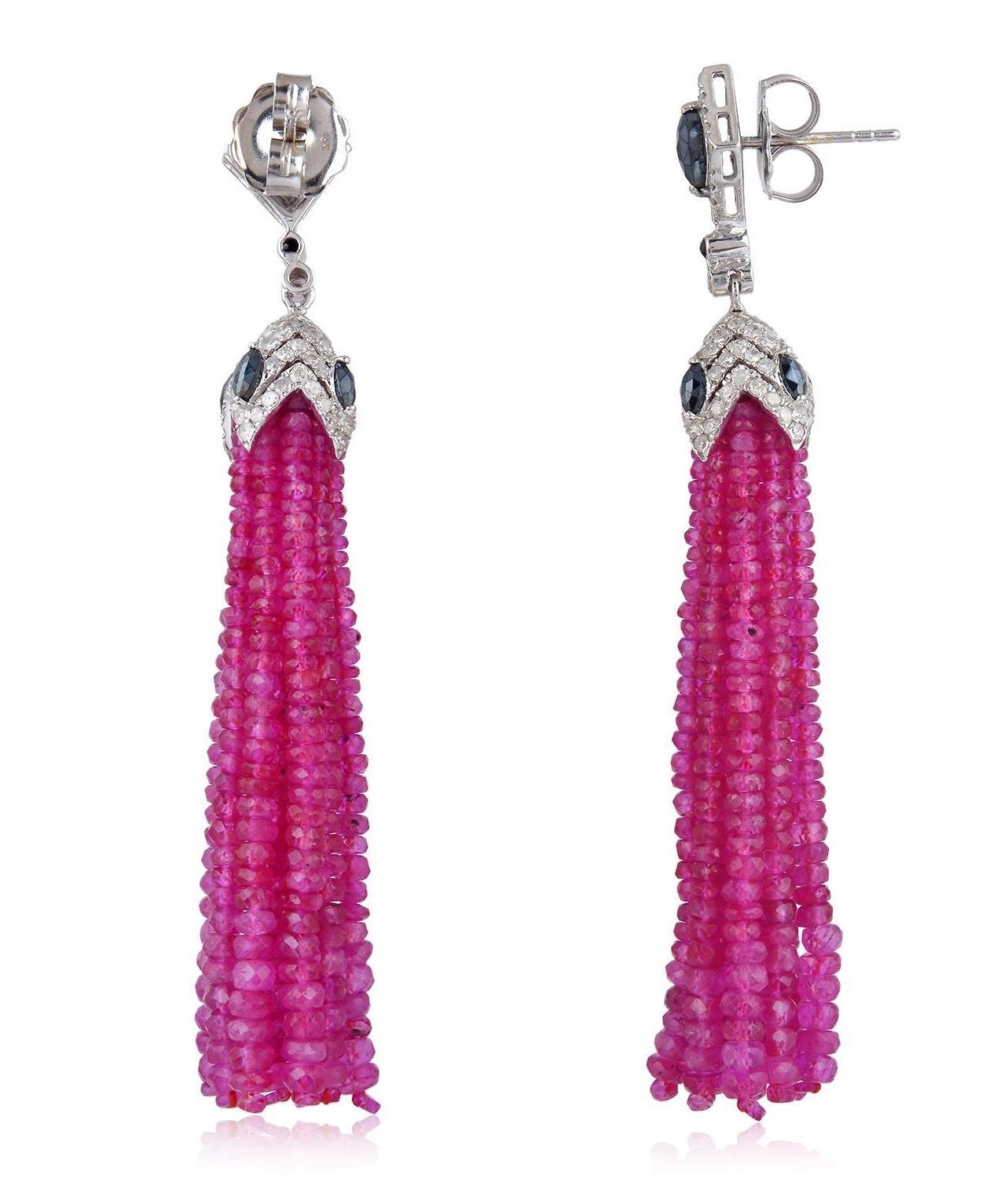 These stunning exceptional tassel earrings are handmade in 18-karat gold & sterling silver.  It is set with 84.89 carats ruby, 1.84 carat spinel and 1.75 carats of glittering diamonds. 

FOLLOW  MEGHNA JEWELS storefront to view the latest collection