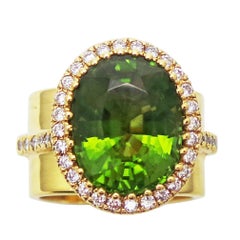 8.49 Carat Burmese Peridot and Diamond Halo 18k Gold Cocktail Ring