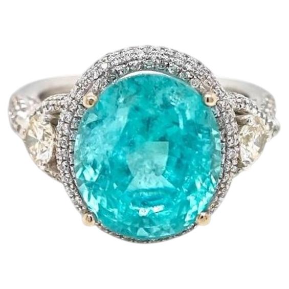Anillo de oro de 18 quilates con turmalina Paraíba ovalada de 8,49 quilates, de color azul-verde neón y con contenido en cobre, certificado por el GIA