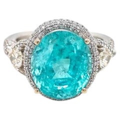 Anillo de oro de 18 quilates con turmalina Paraíba ovalada de 8,49 quilates, de color azul-verde neón y con contenido en cobre, certificado por el GIA