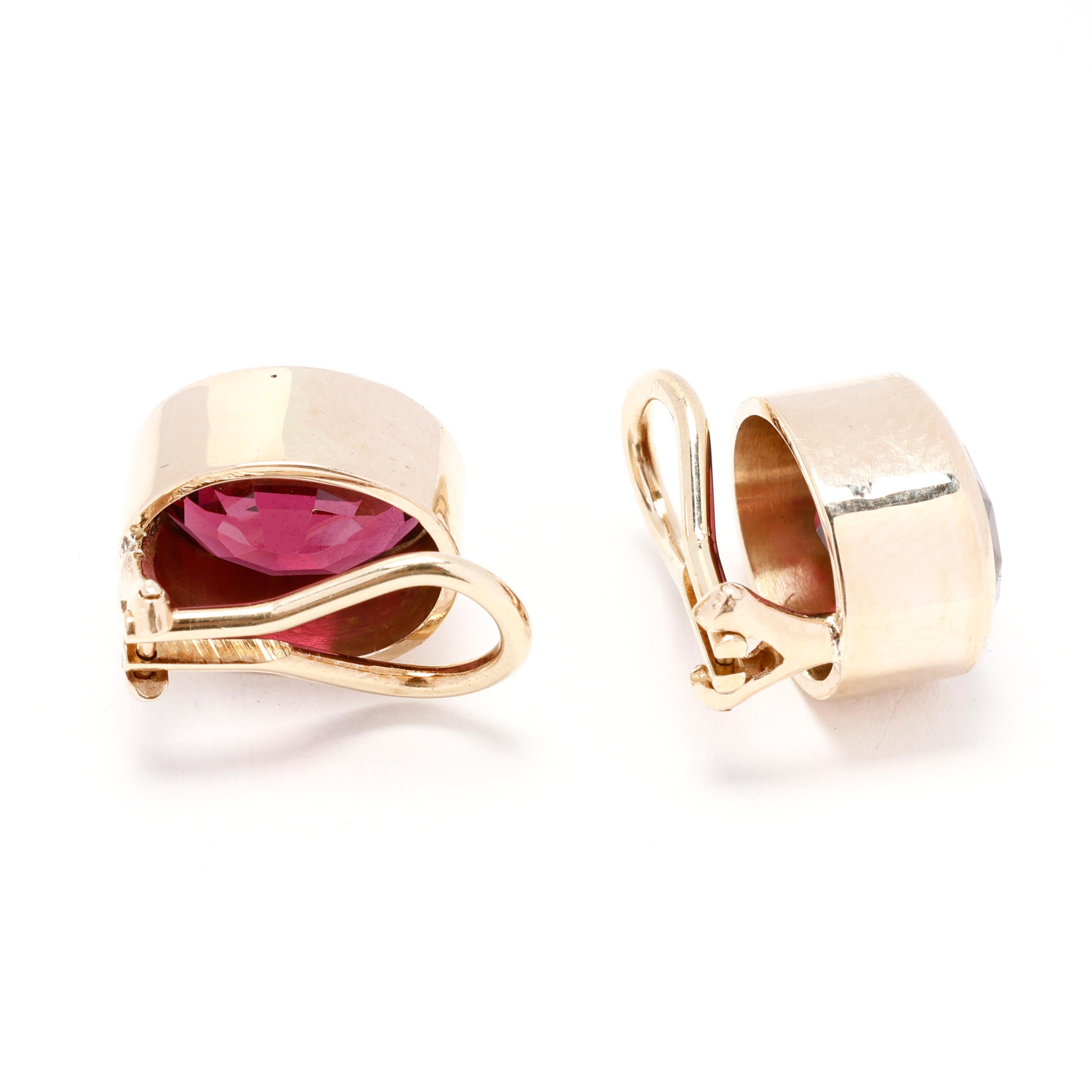 Make a bold statement with these stunning 8.4ctw Rhodolite Garnet Clip-On Earrings. Crafted in luxurious 14k yellow gold, these eye-catching earrings feature vibrant rhodolite garnets that showcase a deep, rich hue, making them a standout accessory
