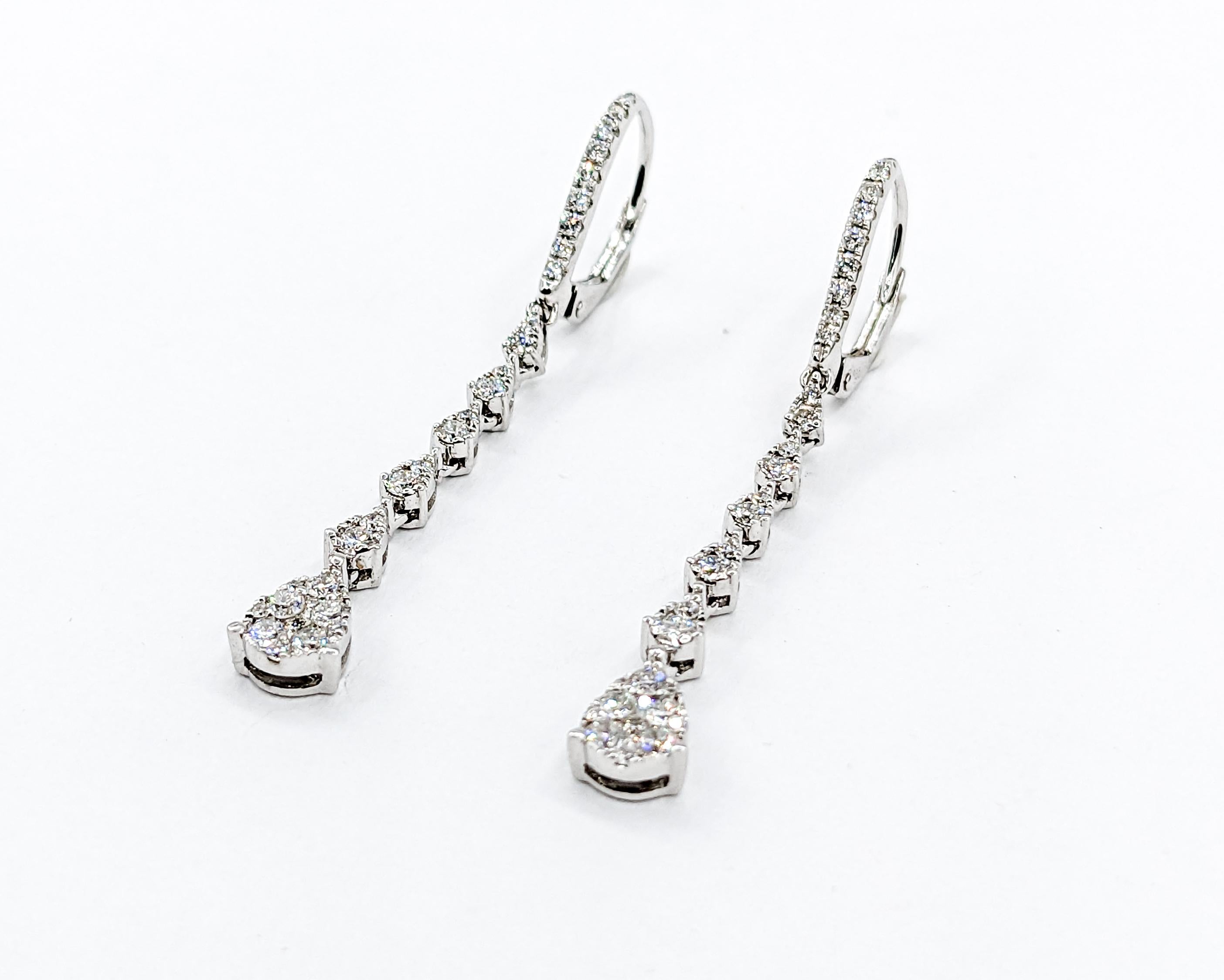 .84ctw VS Quality Diamond Quality Dangle Earrings

Discover the allure of these beautiful earrings, expertly crafted in the luminous 14kw white gold that promises both durability and elegance. They proudly feature a cascading display of 0.84ctw