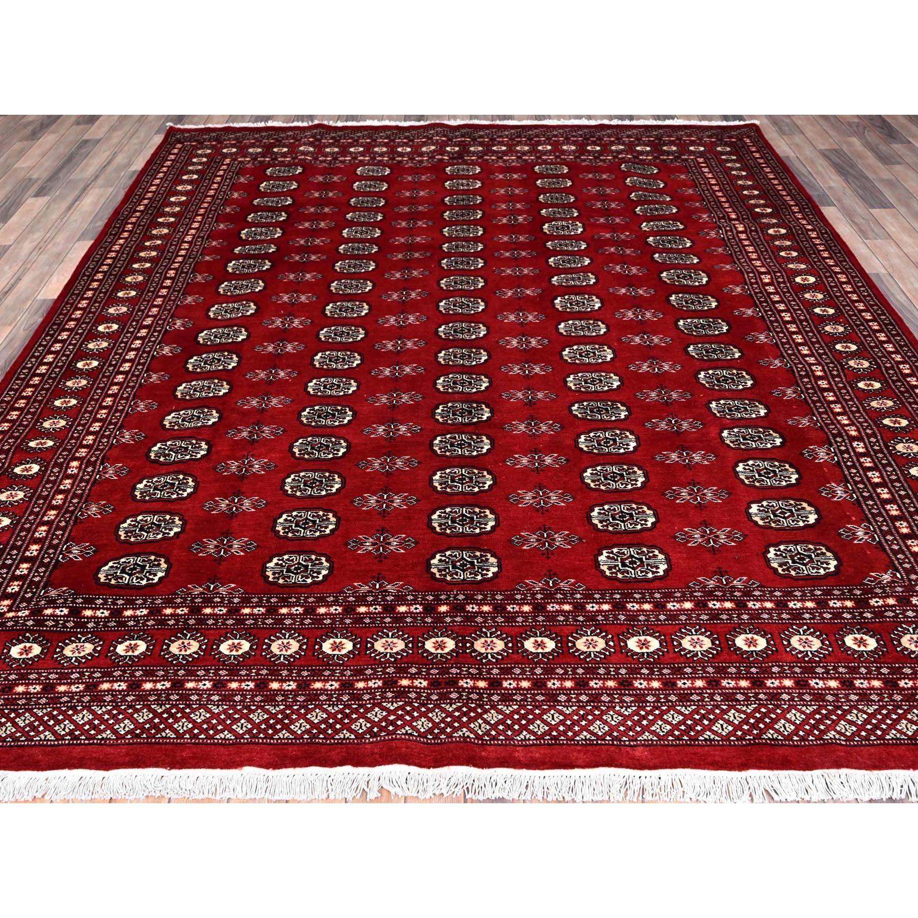 Ruby Red, Princess Bokara with Tribal Medallions, Natural Dyes, 100% Wool, Hand Knotted, Oriental Rug
Primary materials: Wool
Latex: No Pile 
height: 0.25 Inches
Style: Traditional
Primary color: Red
Secondary colors: Black, Beige, Ivory
Pattern:
