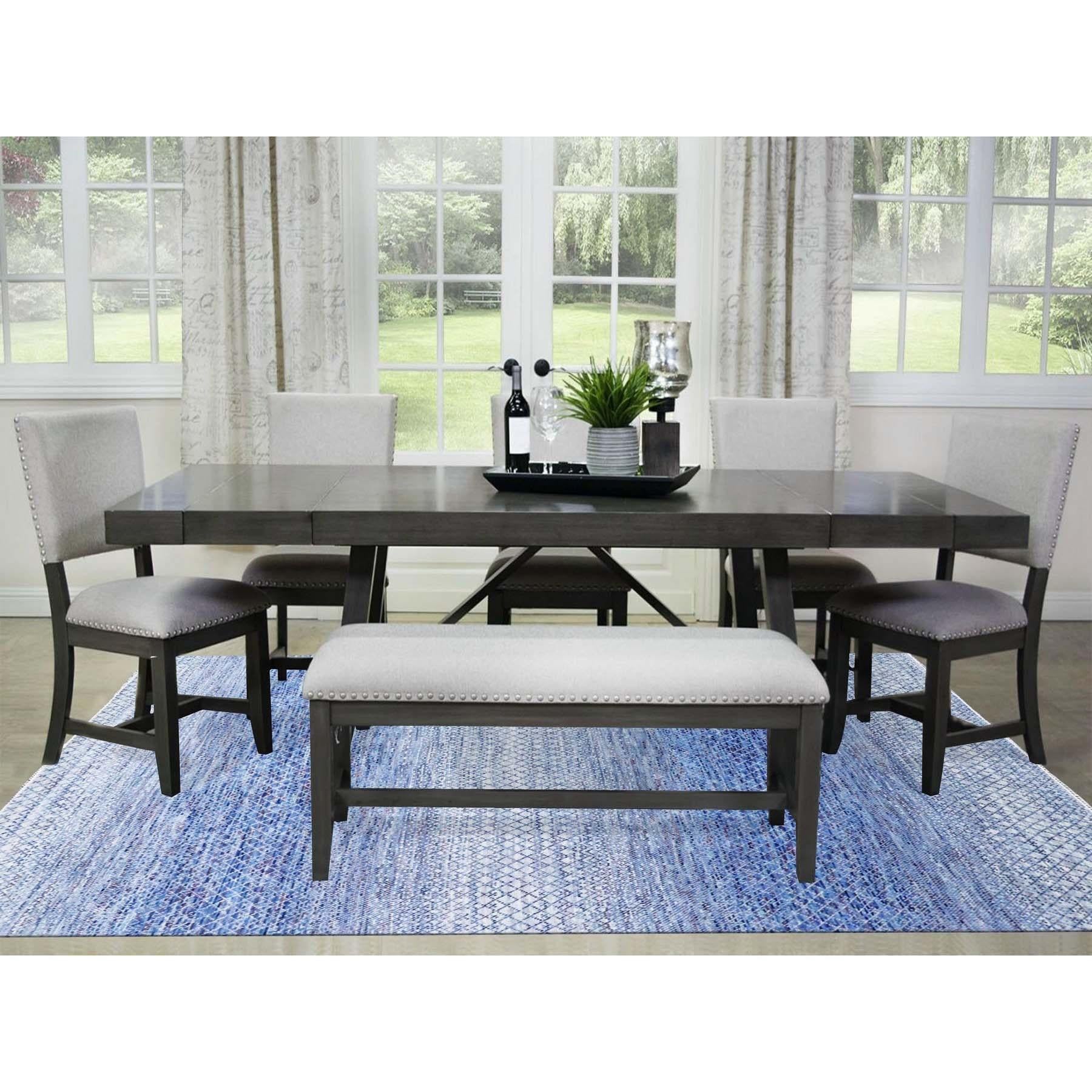 Il s'agit d'un véritable tapis d'Orient bleu, en pure laine, noué à la main, de la collection moderne Chiaroscuro, épais et moelleux. Il a été noué pendant des mois et des mois selon des techniques de tissage séculaires par des artisans