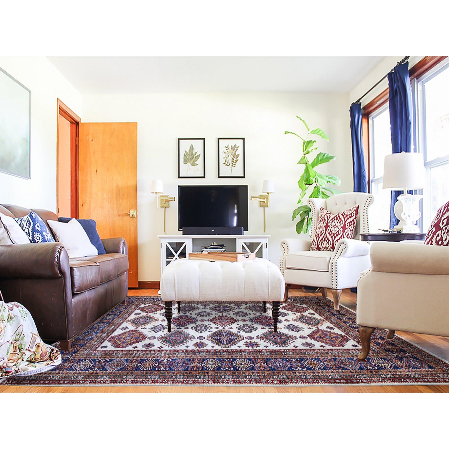 This is a truly genuine one-of-a-kind Afghan Super Kazak, Hand Knotted, Pure Wool, Oriental Rug. It has been Knotted for months and months in the centuries-old weaving craftsmanship techniques by expert artisans.
Primary materials: Wool
Latex: No