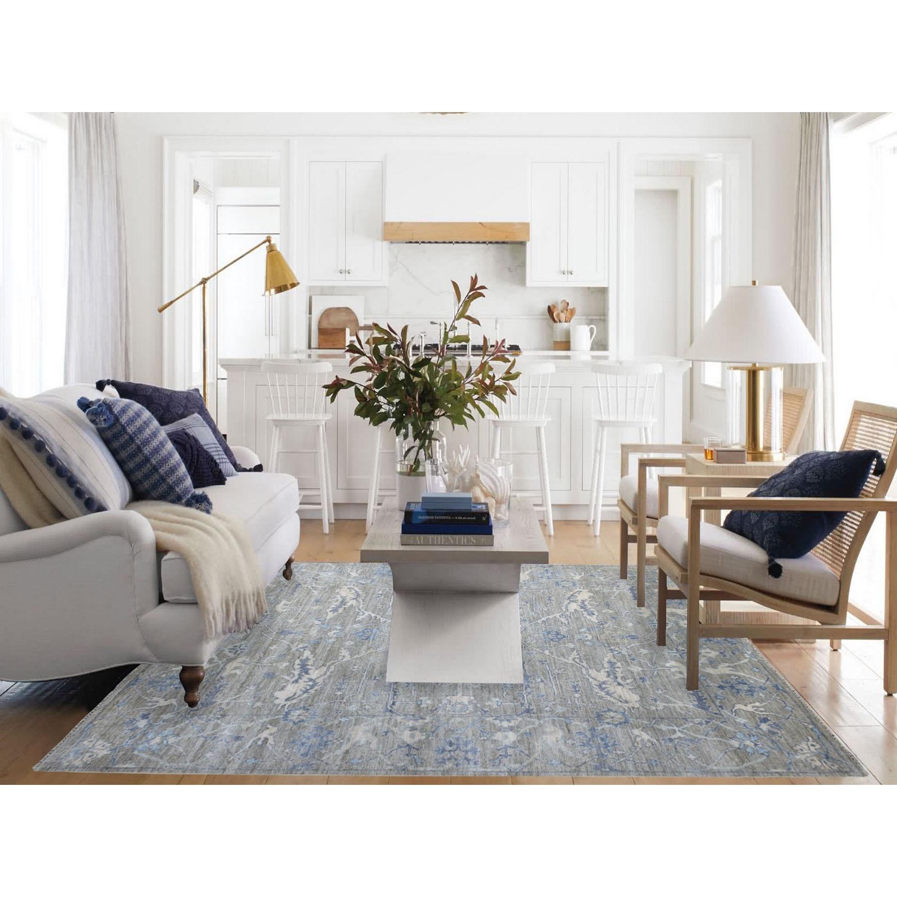 This is a truly genuine one-of-a-kind Hand Knotted Monochromatic Gray With Touches Of Blue Angora Oushak Pure Wool Oriental Rug. It has been Knotted for months and months in the centuries-old weaving craftsmanship techniques by expert