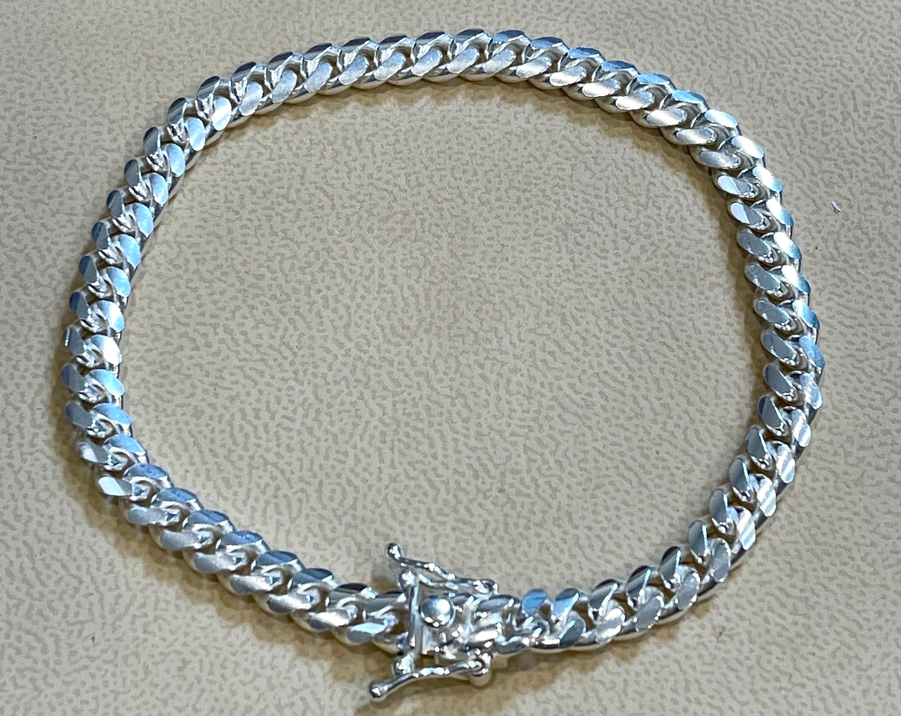 long 8.5 inch , unisex
Pure sterling silver which will not tarnish over time.
8.5 inch long
Cuban style links
Weight of the bracelet is 22.5 grams
I guaranteed you will be very happy .
Super fashionable and amazing bling.
Great for Birthday or
