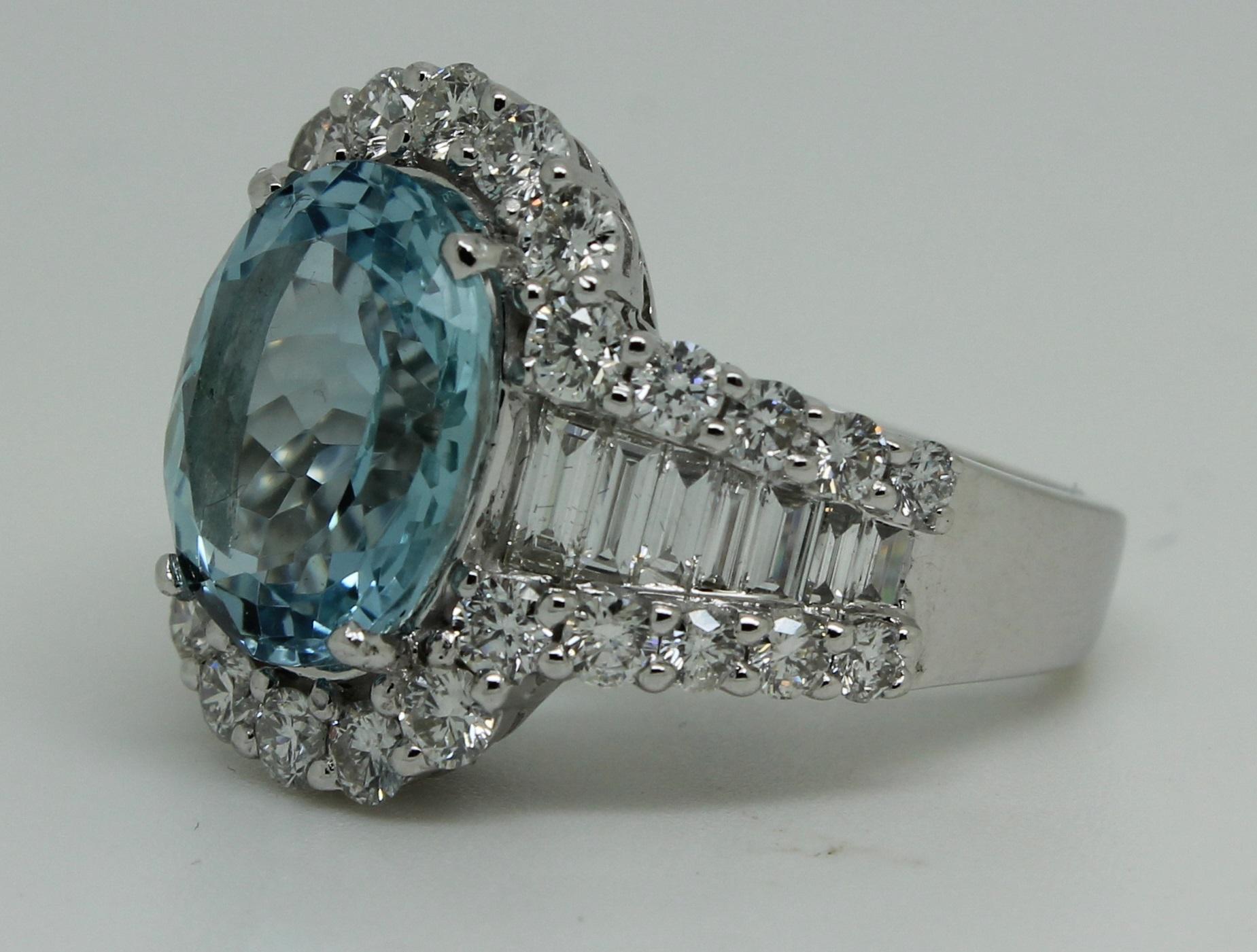 Oval Cut Aquamarine 8.50 Carat Bespoke 18 Karat White Gold 3 Carat Diamond Halo Ring For Sale