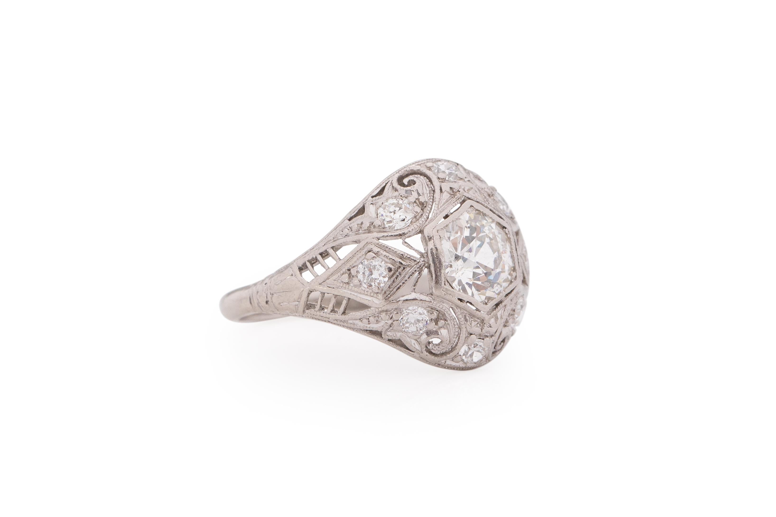 Ring Size: 6
Metal Type: Platinum [Hallmarked, and Tested]
Weight: 4.4 grams

Center Diamond Details:
Weight: .85 carat
Cut: Old European brilliant
Color: F
Clarity: SI2

Side Stone Details:
Weight: .15 carat, total weight
Cut: Antique European