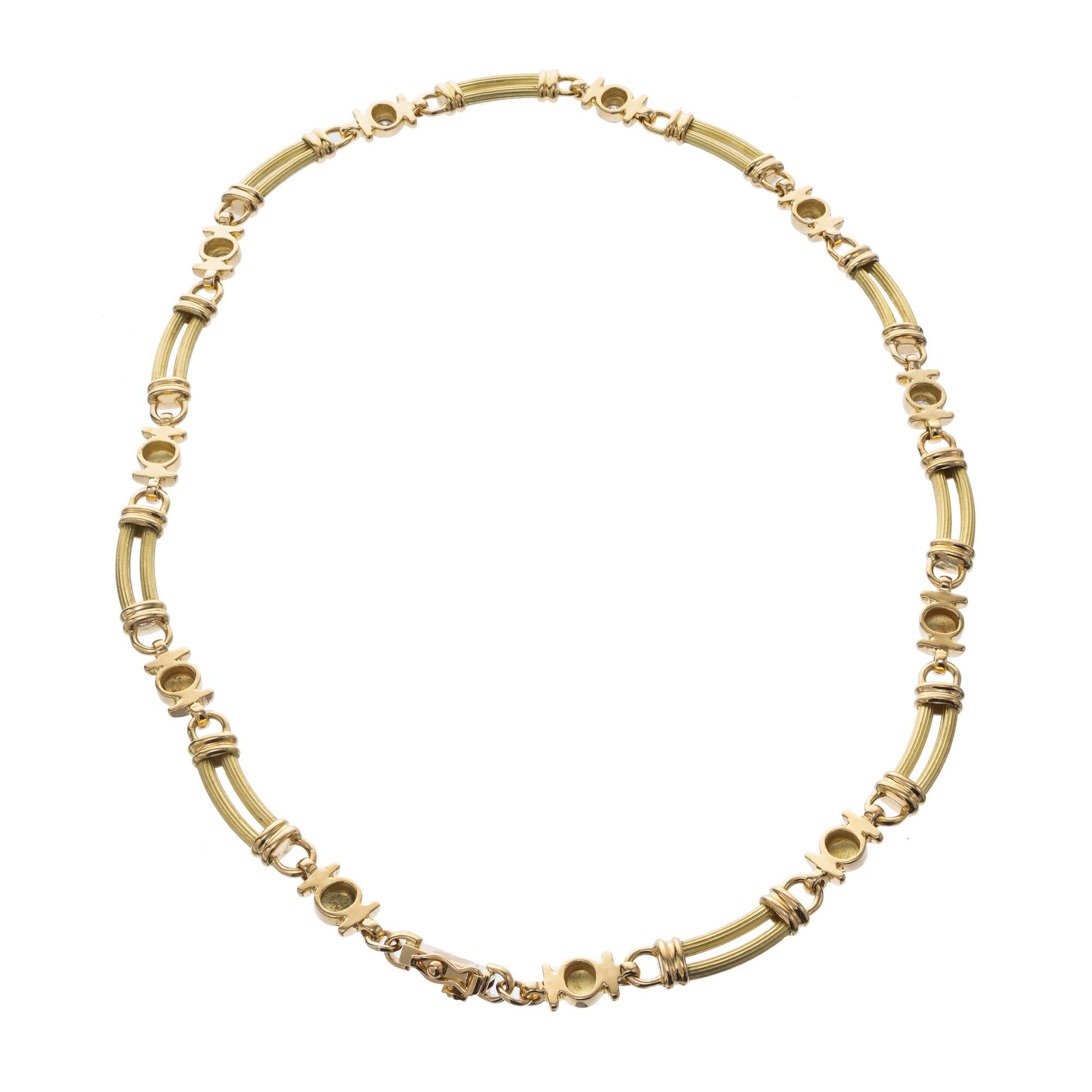 Texteured 18k yellow gold diamond necklace. 16 Inches in length with 5 round brilliant cut accent diamonds. 

5 round brilliant cut diamonds, G-H SI approx. .85cts
18k yellow gold 
Stamped: 18k
45.6 grams
Chain: 16 Inches
Width: