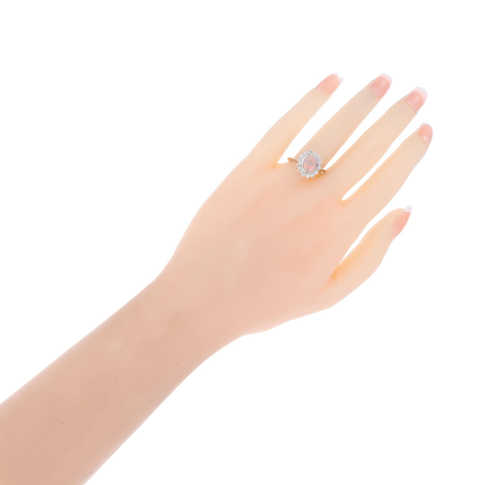 Oval Cut .85 Carat Opal Diamond Halo White Gold Ring For Sale