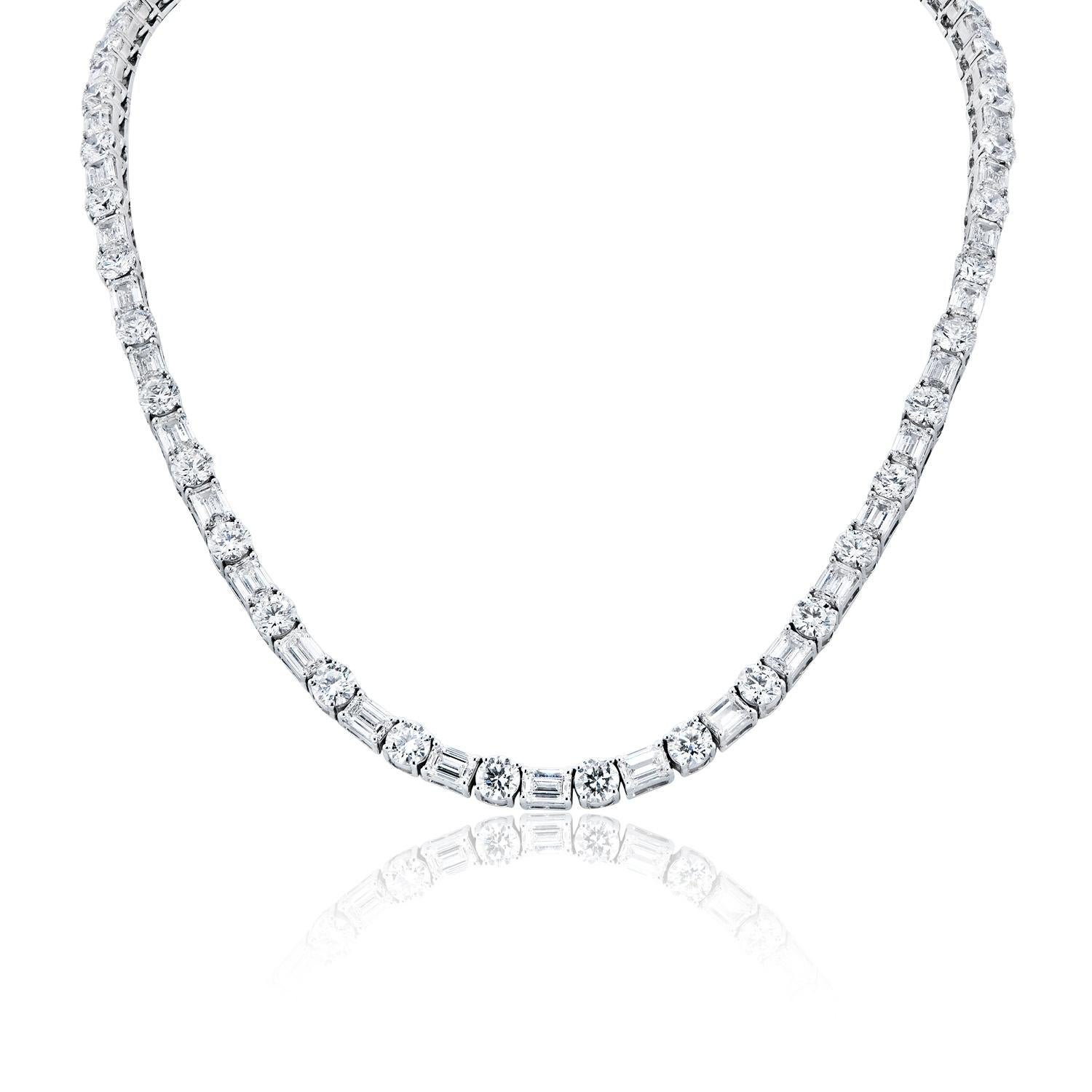 
Carat Weight: 84.42 Carats
Style: Round Brilliant Cut and Emerald Cut (Combine Mix Shape)
Chains: 14 Karat White Gold 93.10 Grams

22 inch Long Diamond Tennis Necklace with Emerald cut and Round Diamonds
