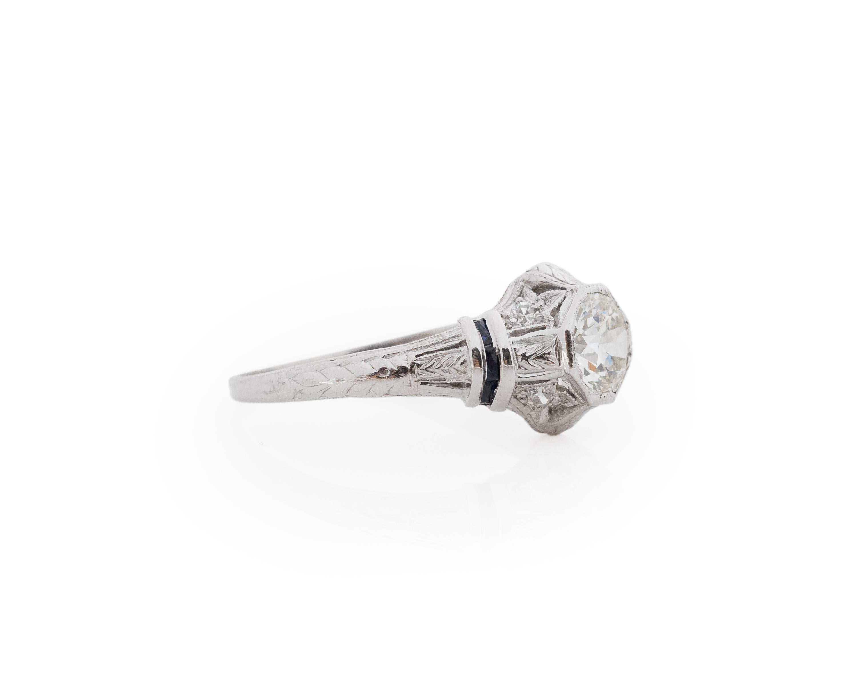 Year: 1940s

Item Details:
Ring Size: 7.75
Metal Type: Platinum [Hallmarked, and Tested]
Weight: 2.8. grams

Center Diamond Details:
Weight: .85ct total weight
Cut: Old European brilliant
Color: G
Clarity: VS
Type: Natural

Finger to Top of Stone