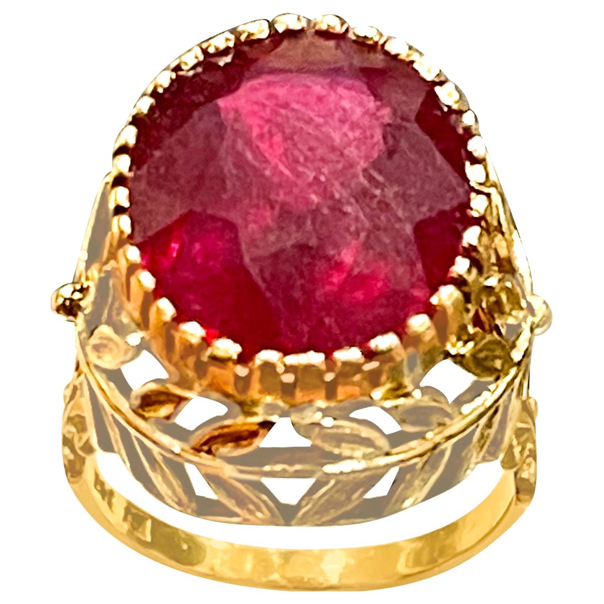 8.5 Carat Treated Oval Ruby 14 Karat Yellow Gold Cocktail Ring ,Vintage Size 6.5
Multiple  prong set
14 K Yellow Gold: 9.6  gram
Stamped 14K
Ring Size 6.5 ( can be altered for no charge )
Large approximately 8.5  carat oval shape ruby Treated 
Very