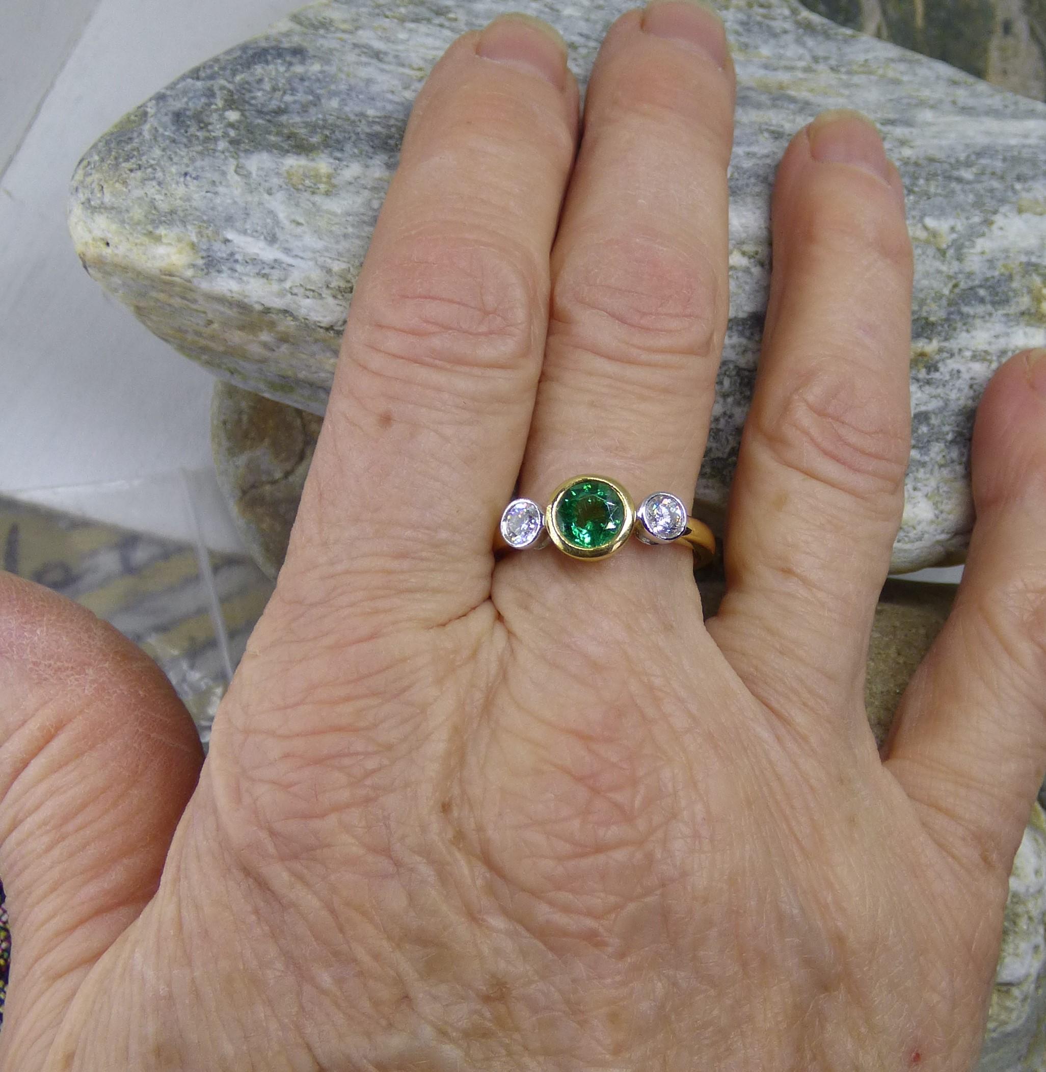 Round Cut .85 ct. Round Emerald and Diamond Three Stone ring in 18K Gold For Sale