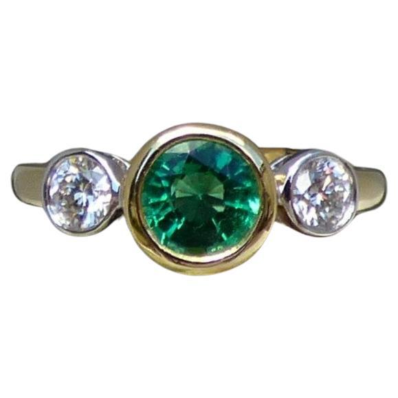 .85 ct. Round Emerald and Diamond Three Stone ring in 18K Gold For Sale