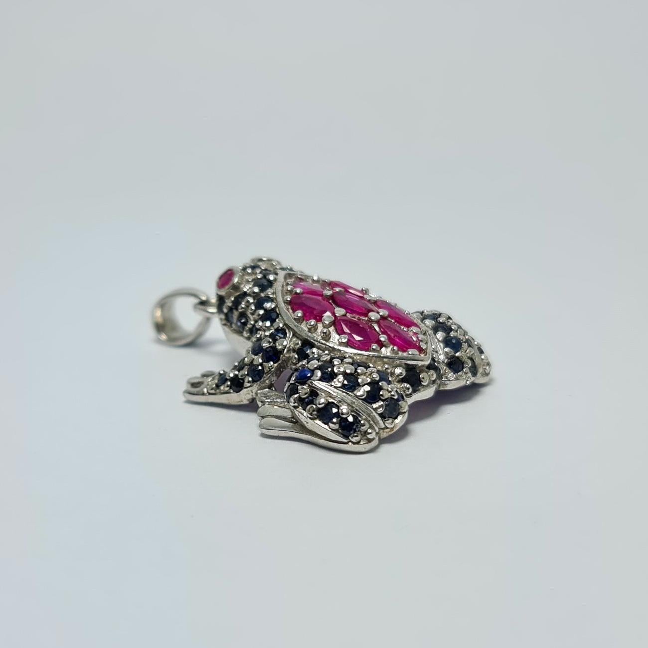 Natural glass filled Thailand Ruby of 3.5 Cts  and Natural Untreated Unheated Blue Thailand Sapphire of 8.5 Cts Frog Designed Pendant set in .925 Sterling Silver Rhodium Plated 