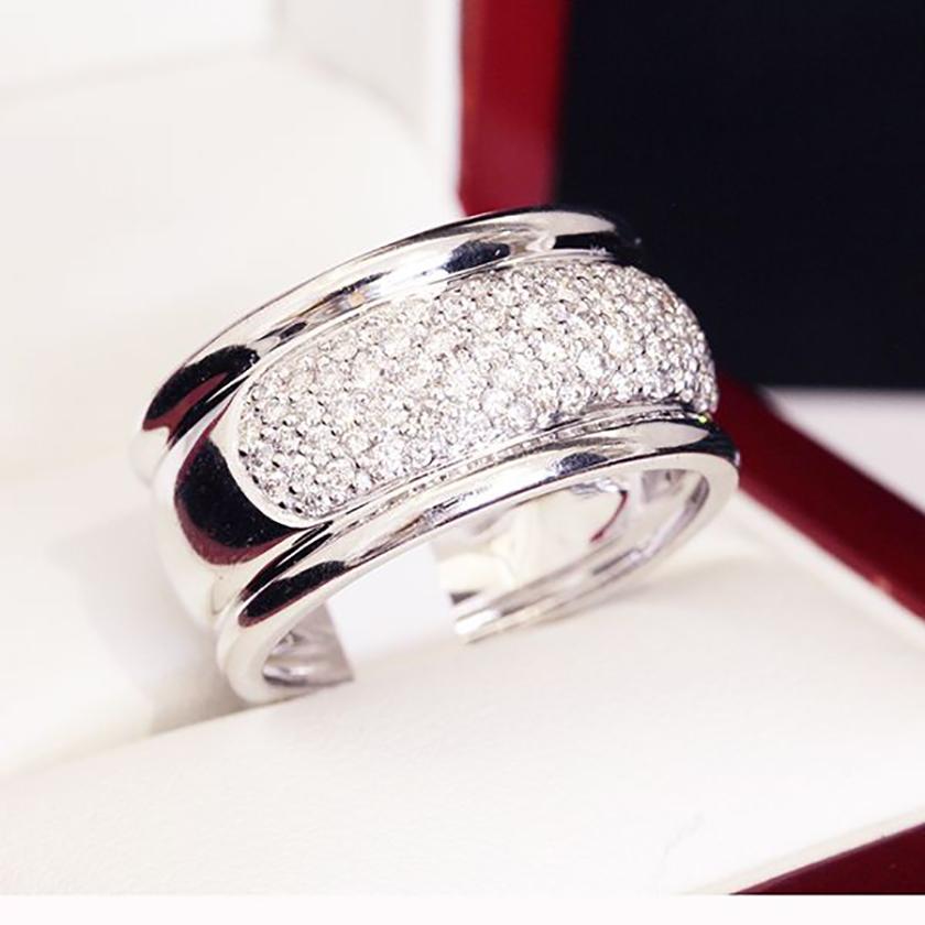 14ct White Gold 85 stone Diamond ring.

85 round brilliant cut Diamonds grain set in a grooved edge 12.11mm band

Diamonds 85 @ 1.7-1.1mm = 1.00cts H/I SI

Total ring weight = 11.25 grams

Manufacture - Cast