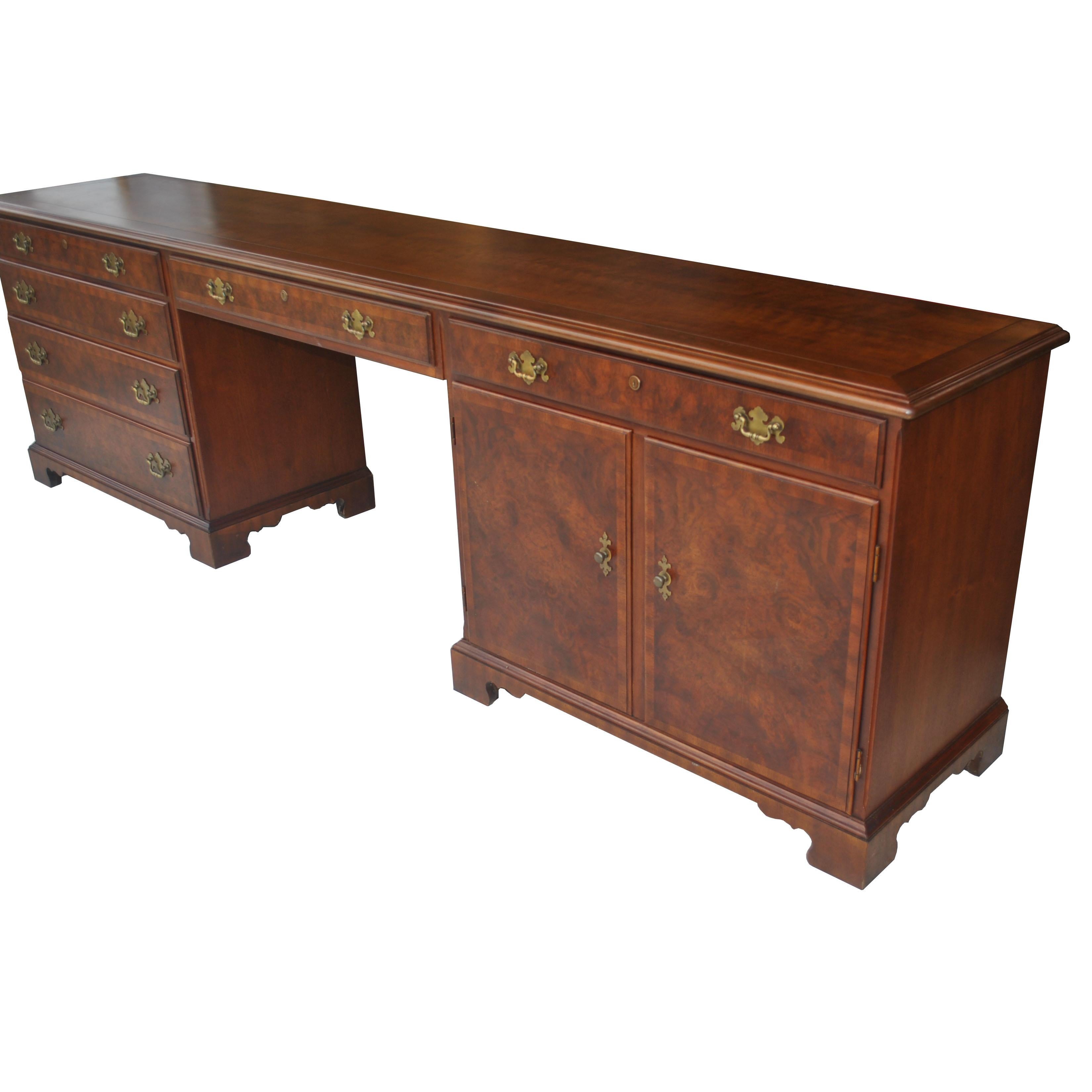 8.5 FT vintage midcentury Widdicomb Burl walnut campaign kneehole credenza


Large knee-hole credenza desk by John Widdicomb. Campaign -style with brass handles. Nine drawers including dual file drawers and roomy cabinets.