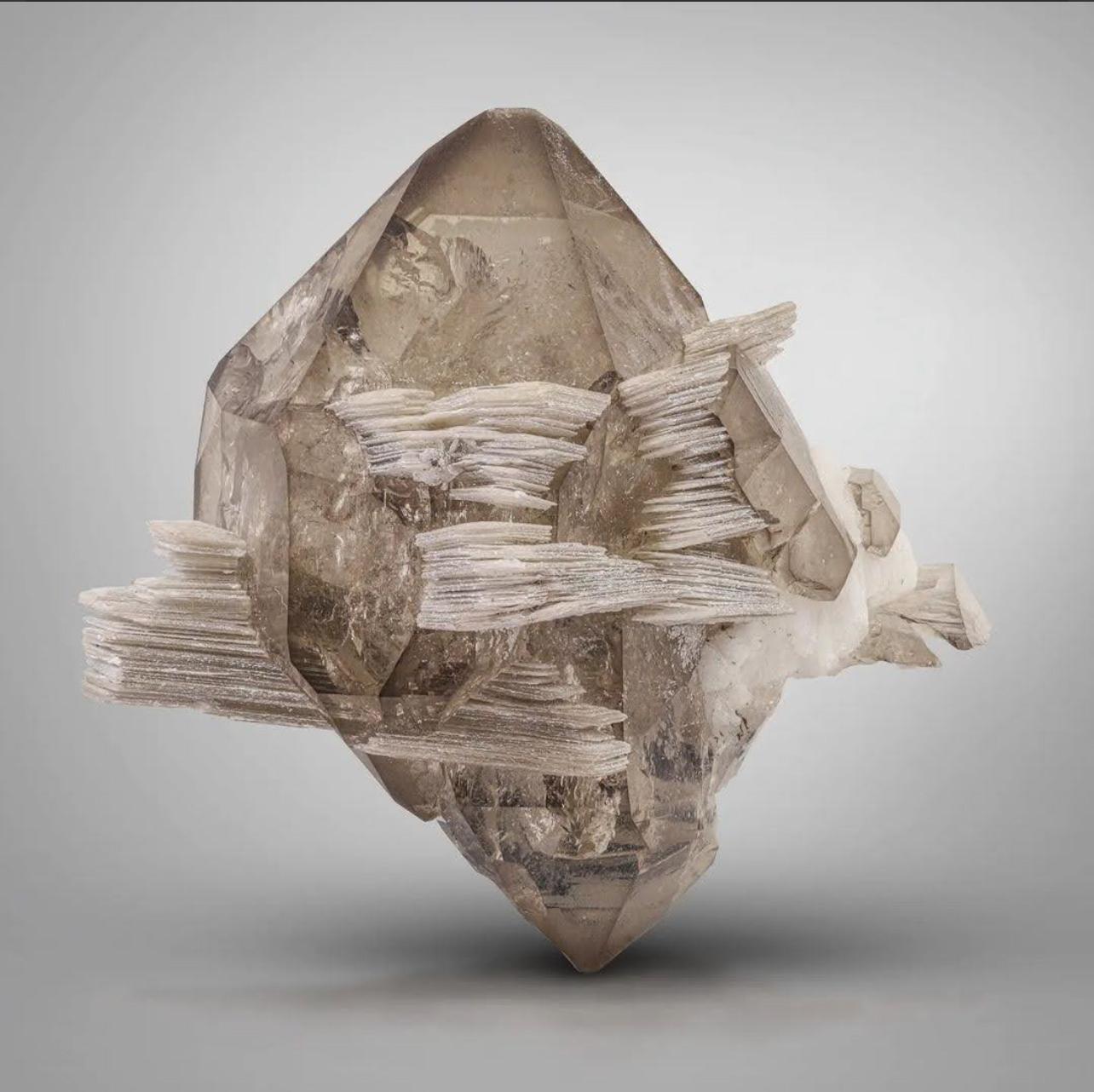 Product Information:

Specimen Type: Smoky Quartz

Weight: 85 grams

Dimension: H: 6.3 x W: 5.5 x D: 4.5 cm

Origin: Skardu District, Gilgit Baltistan Province, Pakistan

Treatment: None

Description: 

This double-terminated smoky quartz crystal,