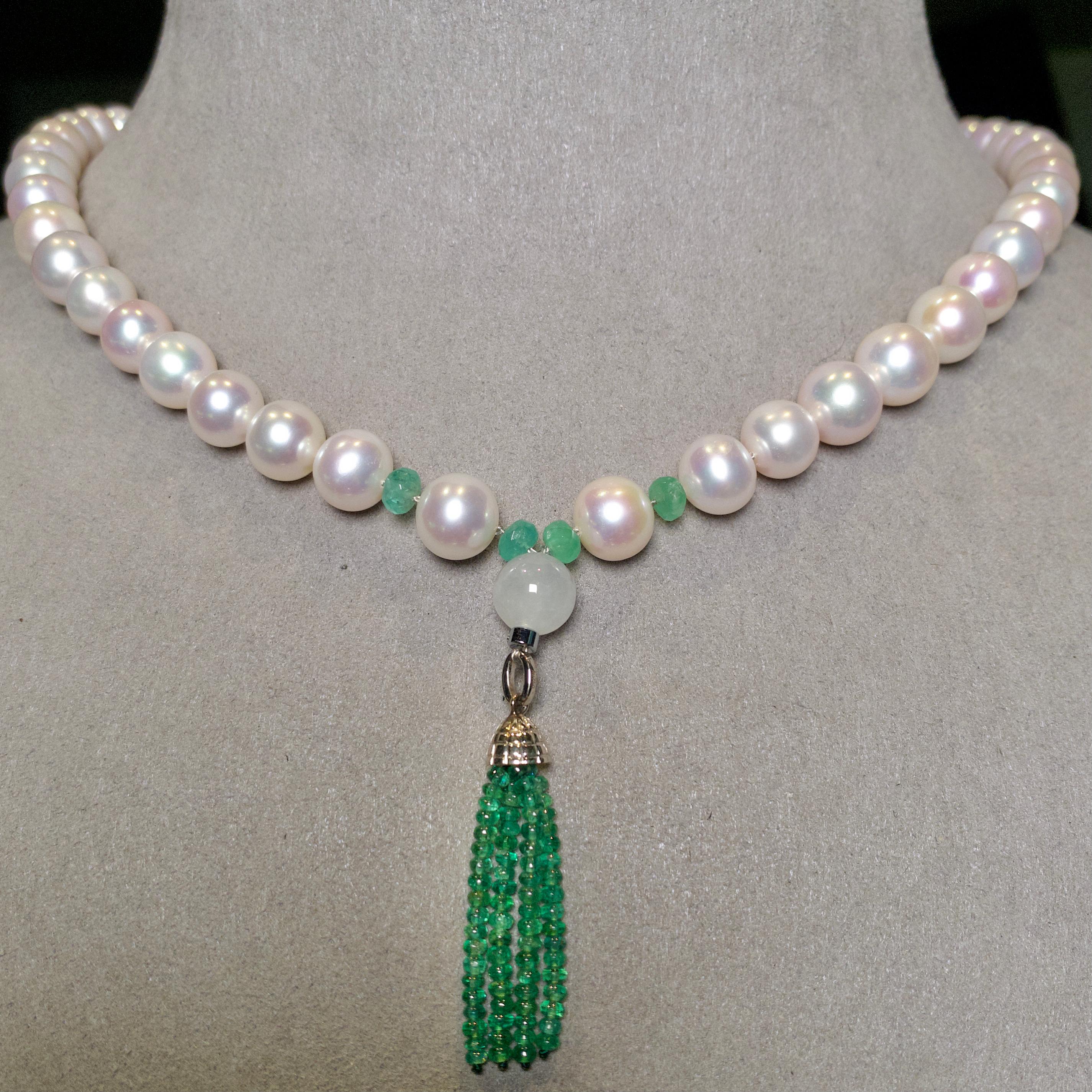 A White Freshwater Pearl, Emerald Bead and Jadeite Bead Necklace with 18k Gold Clasp
Pearls are measuring 8.5 mm to 9 mm 
The colour of the pearls is White with Greena nd Pink Overtone
The Pearls are of Excellent Lustre with smooth surface 
Small