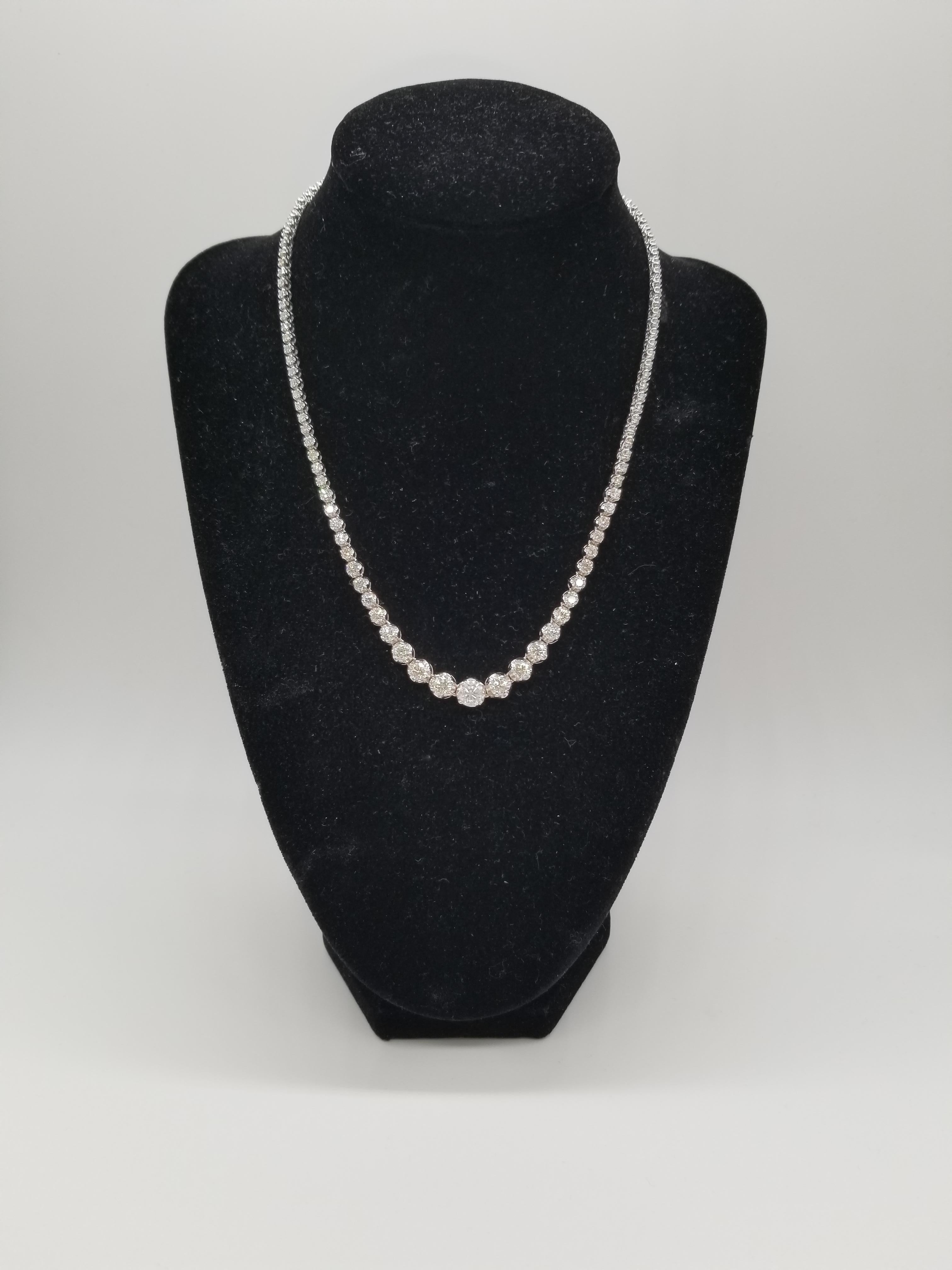 Brilliant and beautiful graduated Riviera necklace, natural round-brilliant cut white diamonds clean and Excellent shine. 14k white gold classic four-prong style for maximum light brilliance. Approx. 8.40 cttw, 16 inch length. Average color I Color,