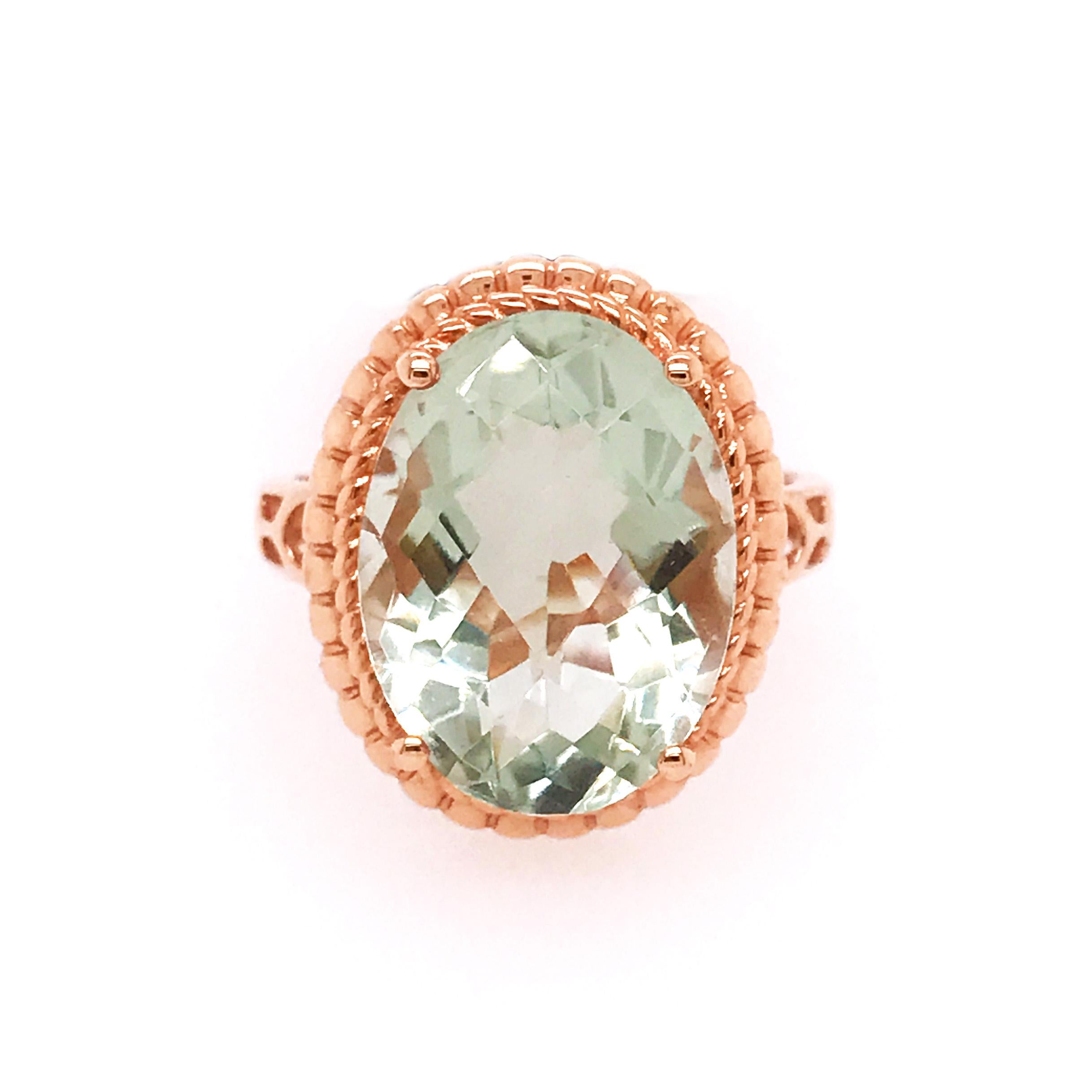 This genuine green amethyst ring is unique! The amethyst has a beautiful, almost sea-foam, pale green color. The oval gemstone has been cut perfectly to radiate the most brilliance possible. Set in a rose gold setting make just for this stone. The