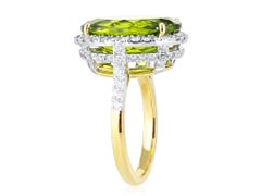 8.50 Carat Oval Shaped Peridot and Diamond Ring