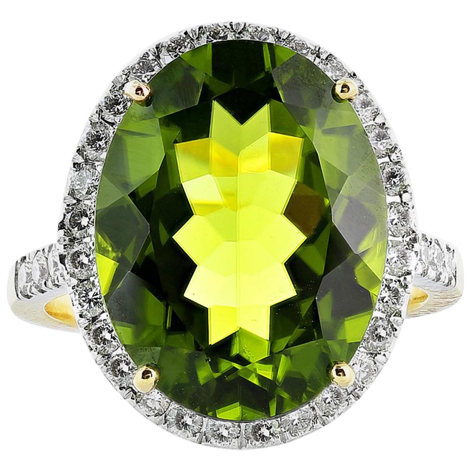 8.50 Carat Oval Shaped Peridot and Diamond Ring For Sale