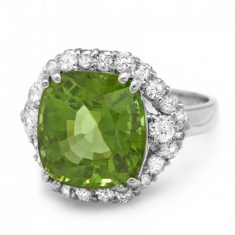 8.50 Carats Natural Peridot and Diamond 14K Solid White Gold Ring

Total Natural Cushion Peridot Weight is: Approx. 7.40 Carats 

Peridot Measures: Approx. 12 x 11 mm

Natural Round Diamonds Weight: Approx. 1.10 Carats (color G-H / Clarity