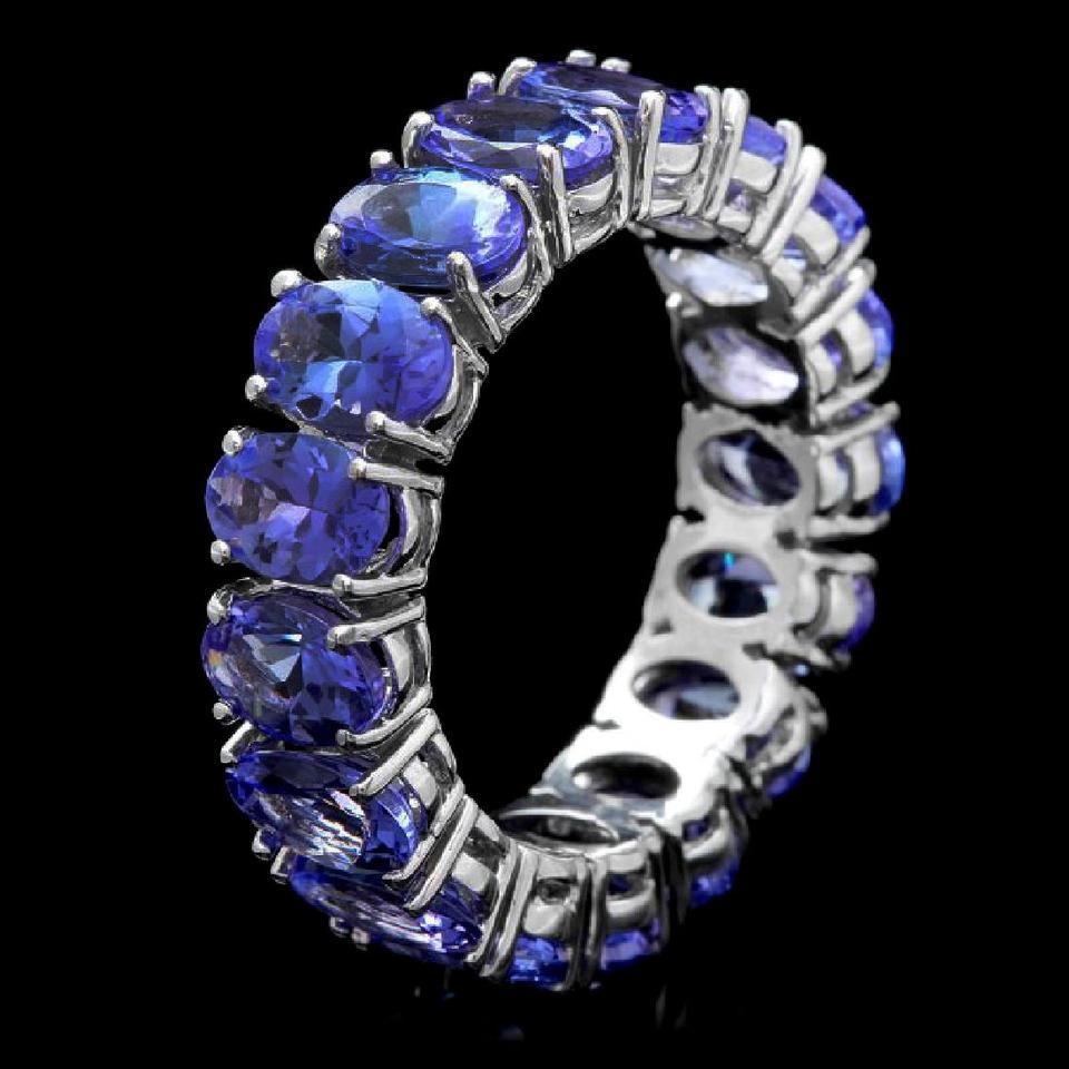 8.50 Carats Natural Very Nice Looking Tanzanite 14K Solid White Gold Ring

Total Natural Oval Cut Tanzanites Weight is: 8.50 Carats

Tanzanite Measures: 6 x 4mm

Tanzanite Treatment: Heat

Ring size: 7.5 (we offer free re-sizing upon request)

Ring