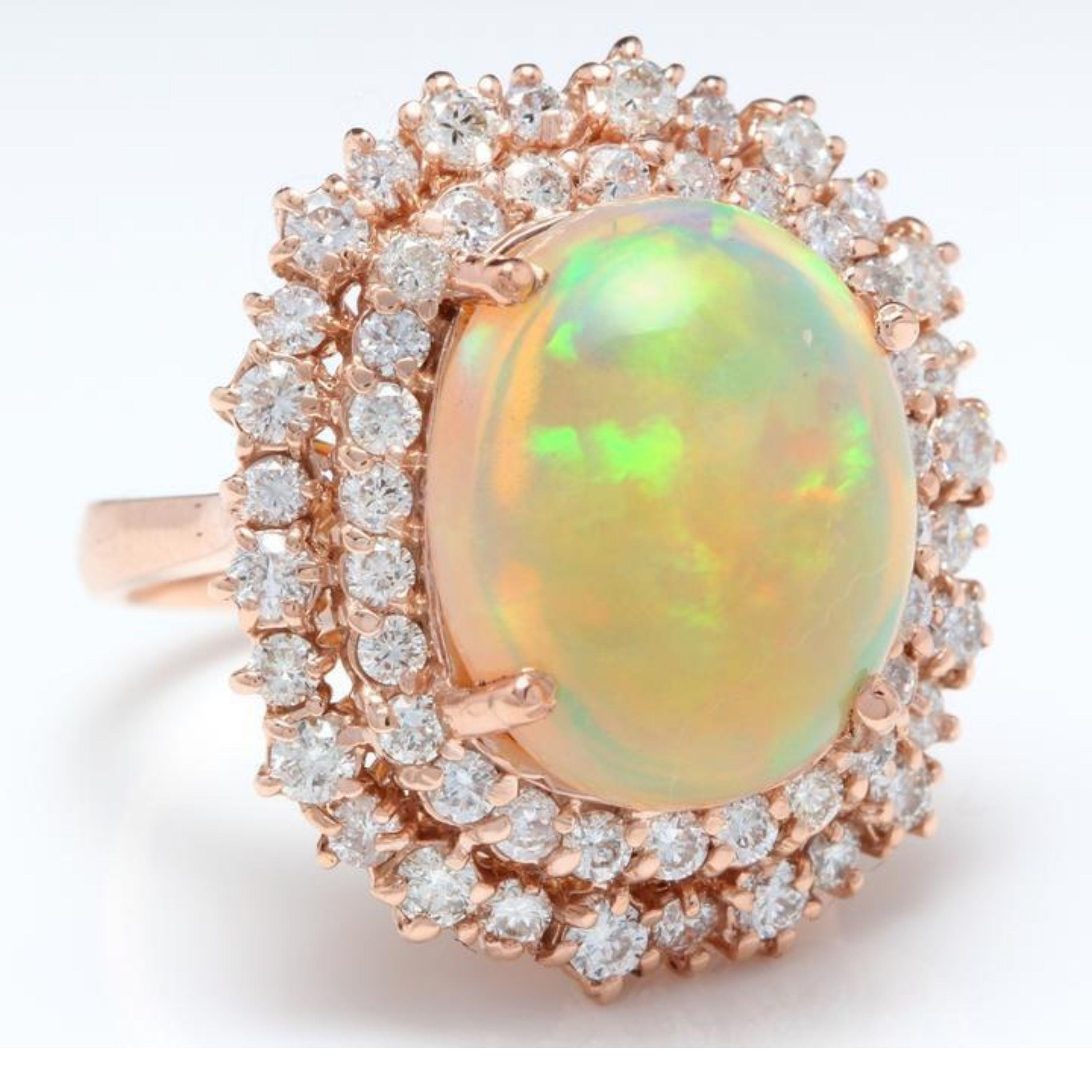 Anillo de oro rosa macizo de 14 quilates con un impresionante ópalo etíope natural de 8,50 quilates y diamantes

El peso total del ópalo natural es Aprox. 6.50 Quilates

Medidas del ópalo: Aprox. 15.00 x 12.00mm

La cabeza del anillo mide Aprox.