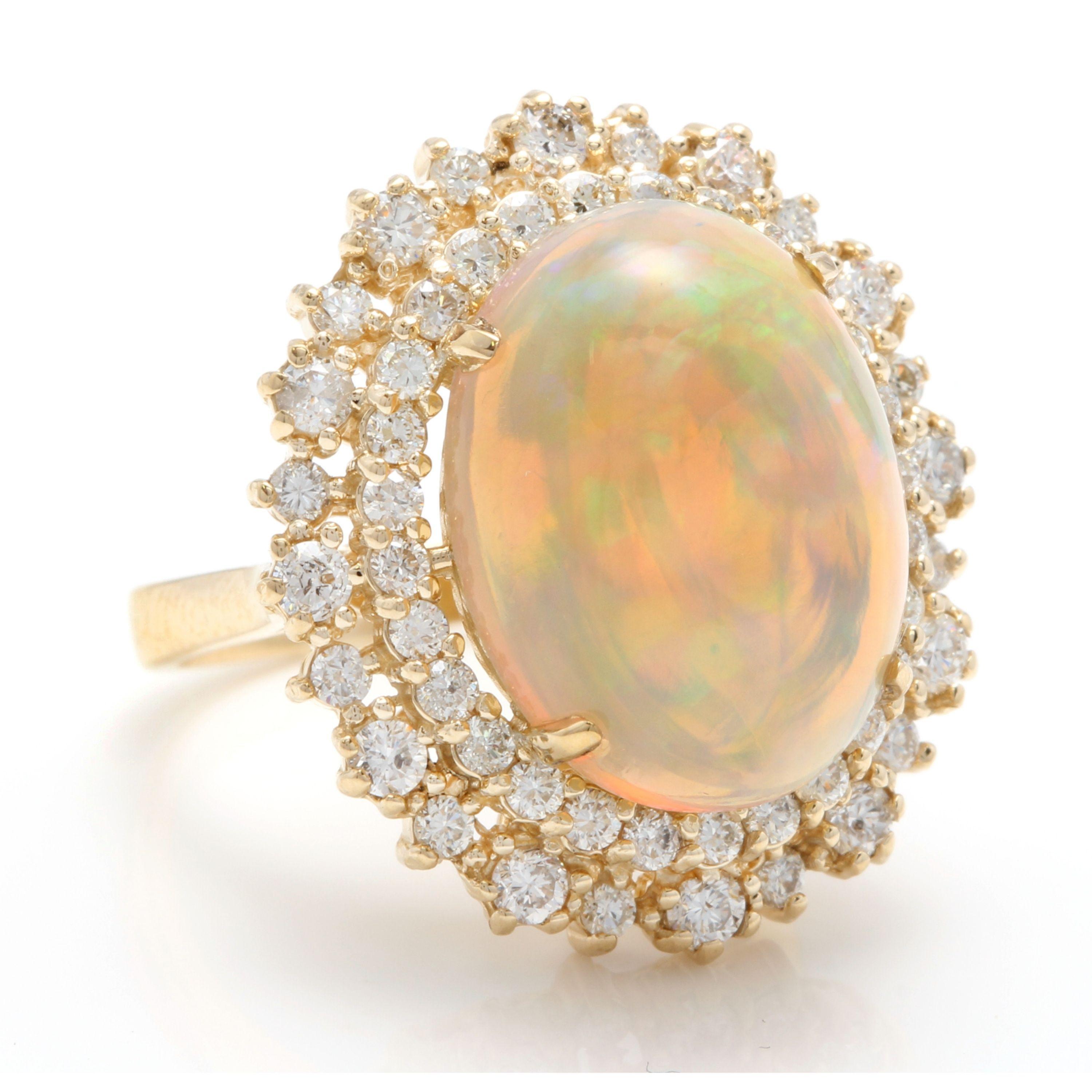 Anillo de oro amarillo macizo de 14 quilates con un impresionante ópalo etíope natural de 8,50 quilates y diamantes

El ópalo tiene un fuego precioso, ¡las fotos no muestran toda la belleza del ópalo!

El peso total del ópalo natural es Aprox. 7.00