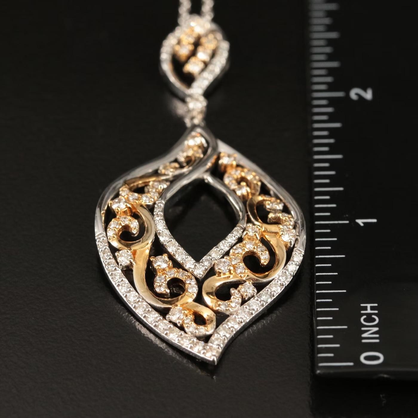 Designer EFFY necklace, fully hallmarked

NEW with tags, Tag price $8500

Leaf design, amazing and supersized statement piece, about 2.5 inch in drop length

14K White and Yellow gold pendant, stamped 14K

1.79 CT Diamond, Great quality & super