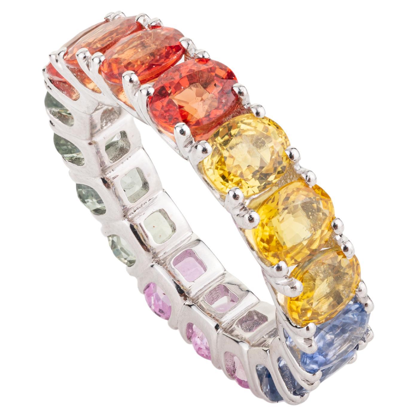 For Sale:  8.51 Carat Multi Colored Oval Sapphire 18k White Gold Eternity Band Ring