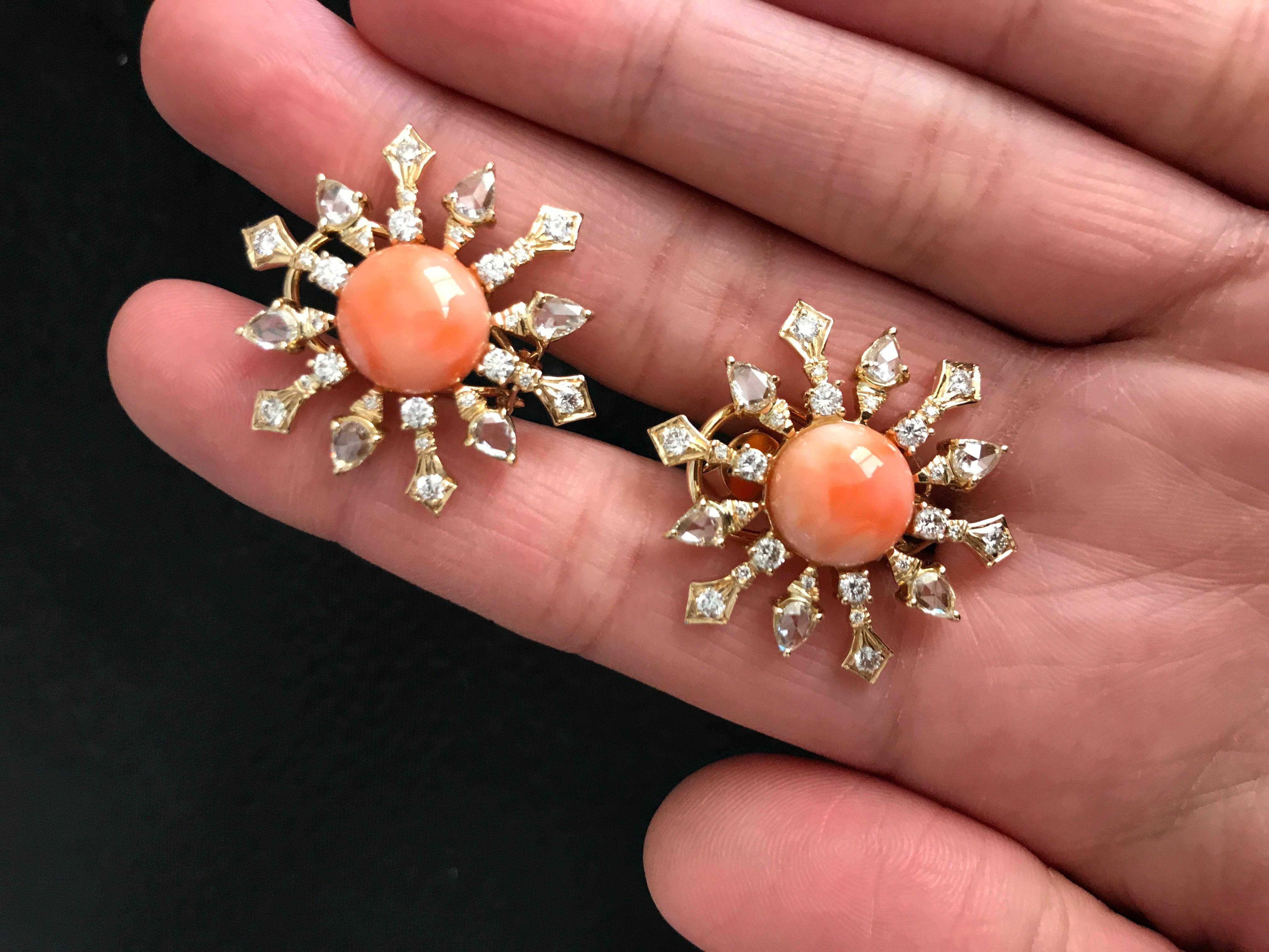 A very unique pair of statement stud earrings, using high-quality round-shape Italian Coral and rose cut / full cut Diamonds, all set in 18K yellow gold. 

Material Details:

Stone: Italian Coral
Weight: 8.51 carats
Shape: Round

Diamonds:
Weight: