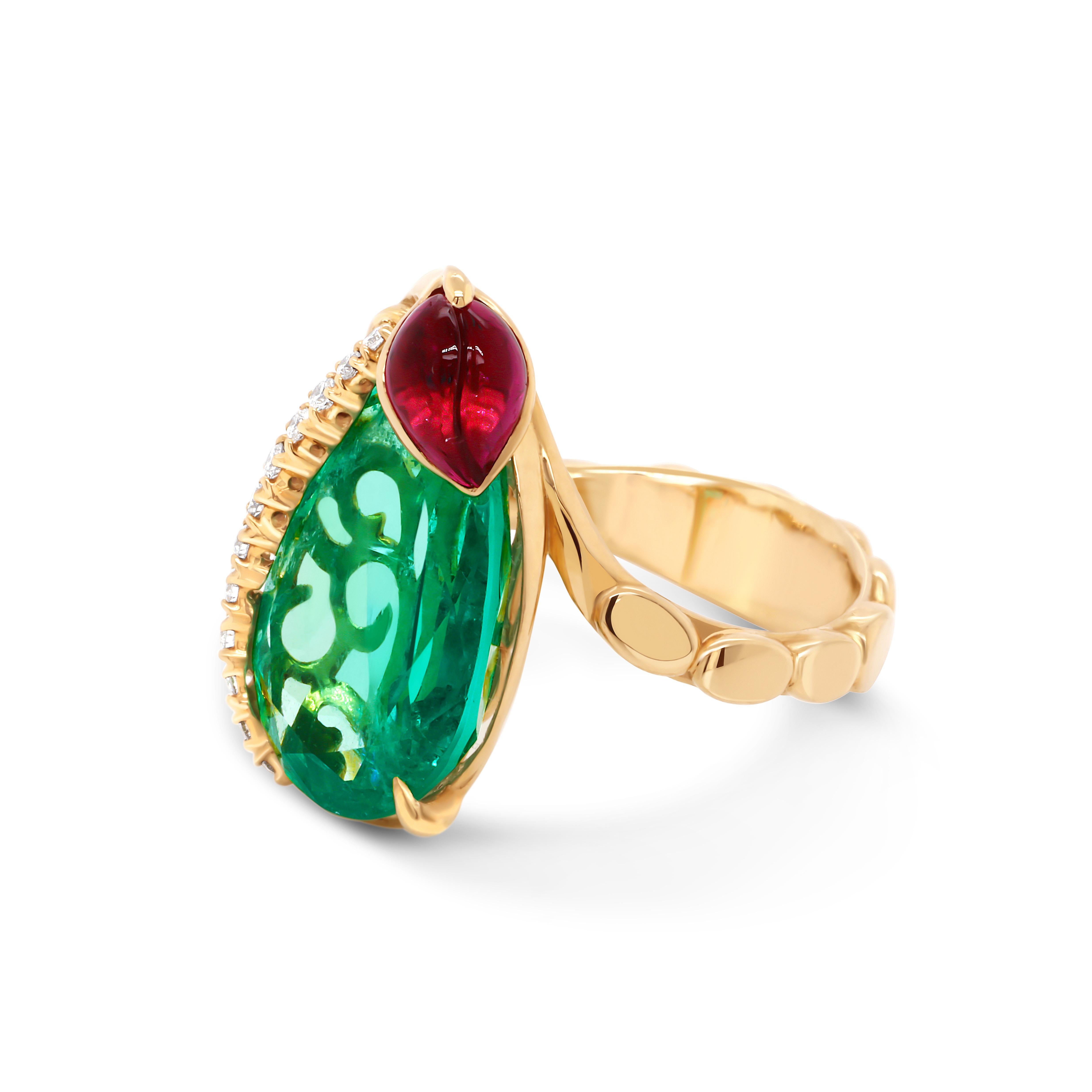 Magnificent and eye-catching 18 Karat Yellow Gold Ring featuring certified 8.51ct Colombian Emerald accented by leaf shaped Rubellite and 12 White Diamonds totaling 0.17 ct. Combination of colors and shapes inspired by nature!

This teardrop-shaped