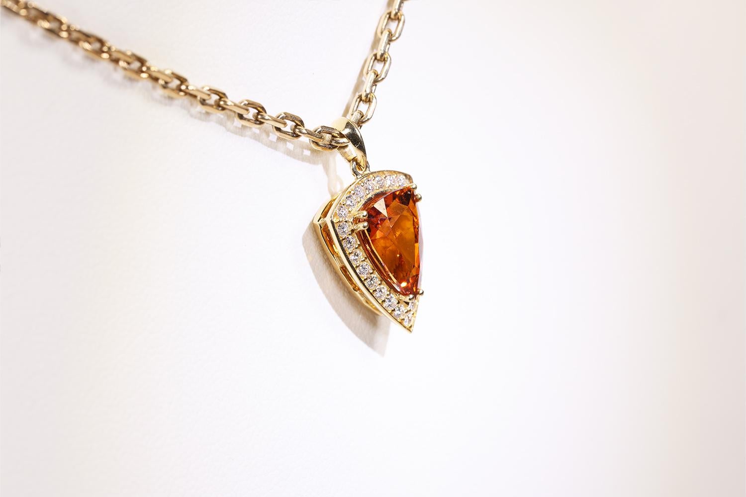 Modern 3.52 Carat Hessonite Garnet Pendant with Diamond Halo set in 18K Yellow Gold For Sale